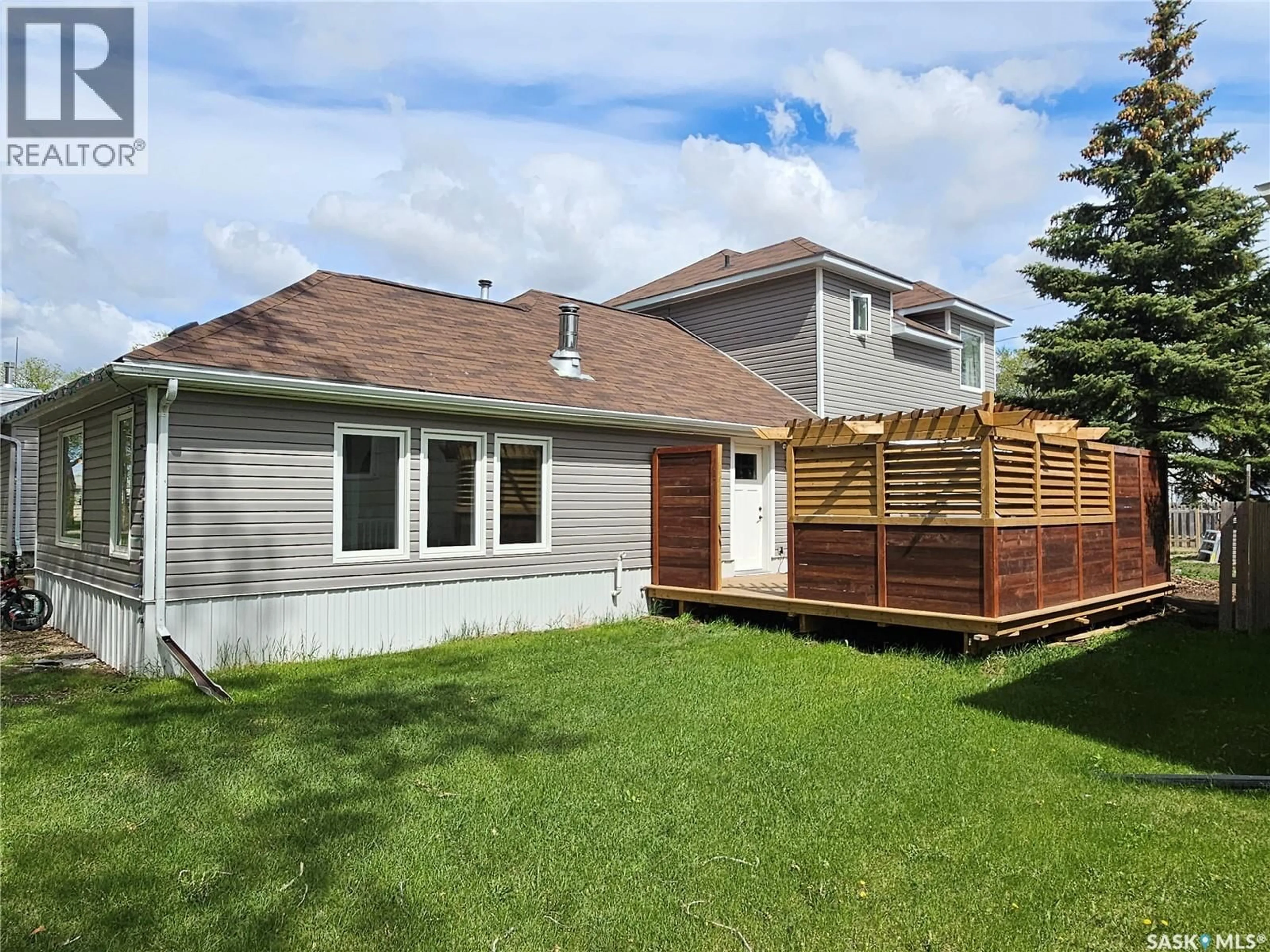 Home with vinyl exterior material, street for 117 2ND STREET, Carlyle Saskatchewan S0C0R0