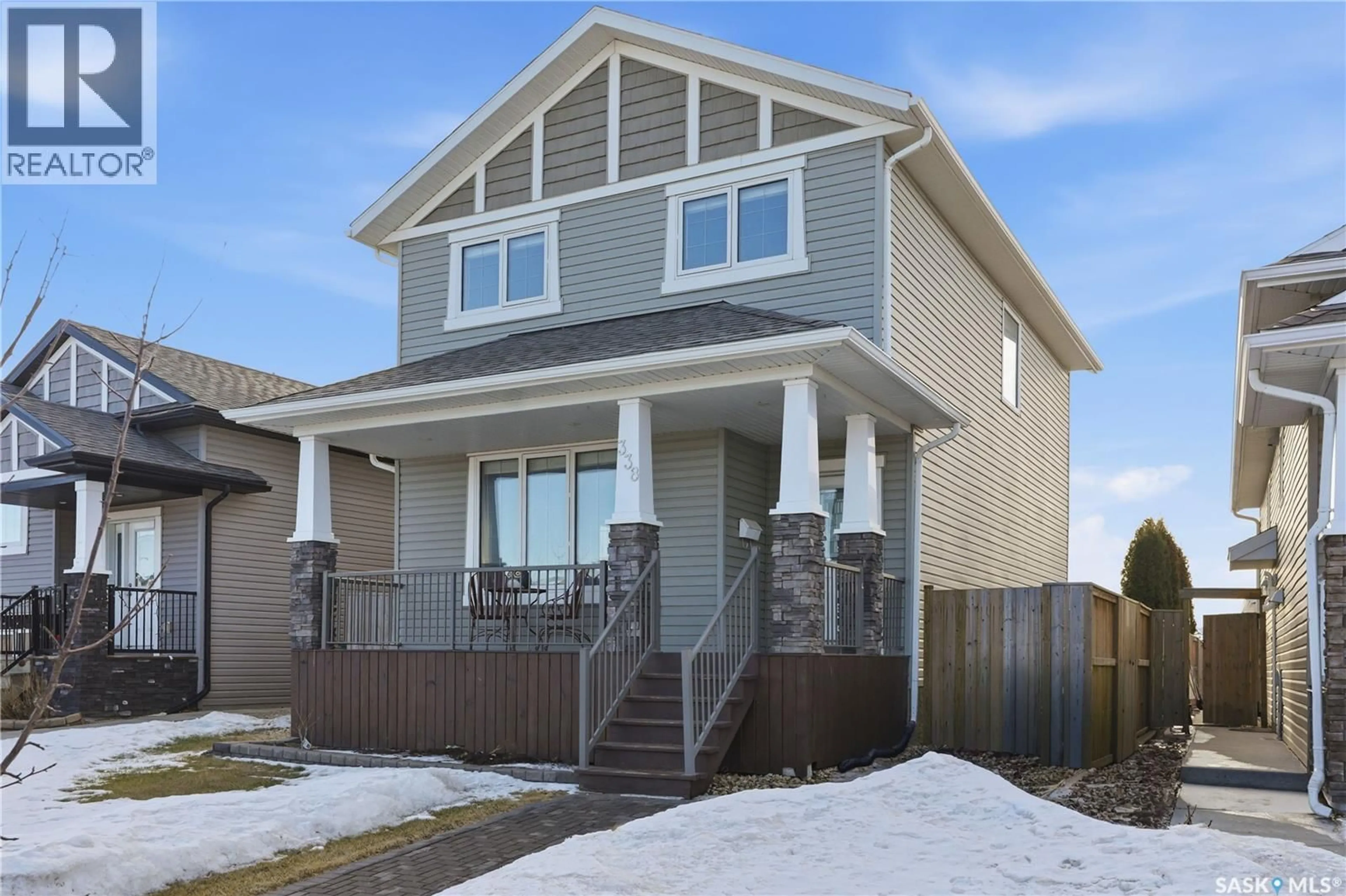 Home with vinyl exterior material, street for 338 ROSEWOOD BOULEVARD, Saskatoon Saskatchewan S7V0G9