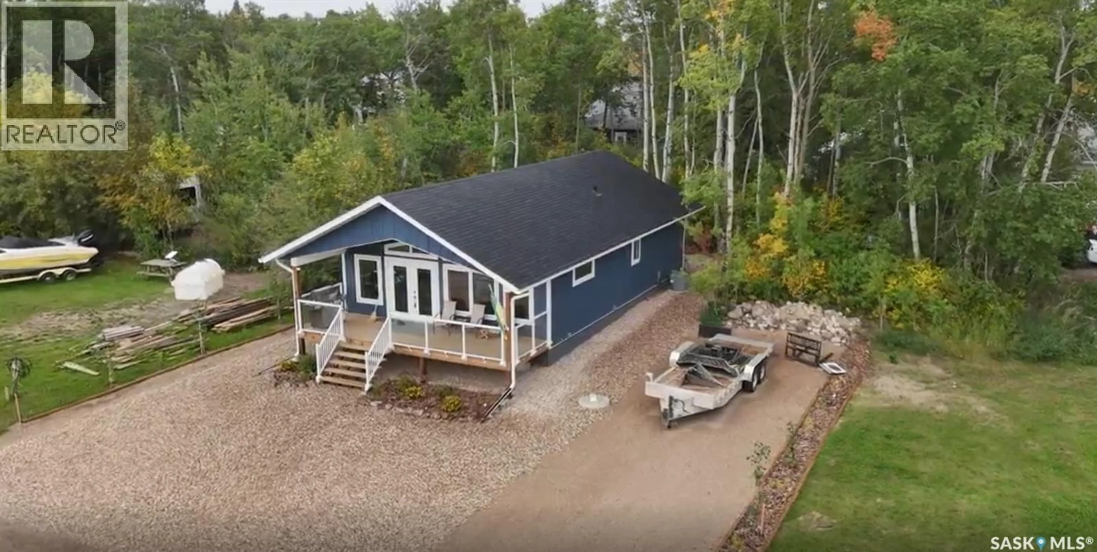 A pic from outside/outdoor area/front of a property/back of a property/a pic from drone, water/lake/river/ocean view for 105 PRINCE CRESCENT, Fishing Lake Saskatchewan S0A4T0