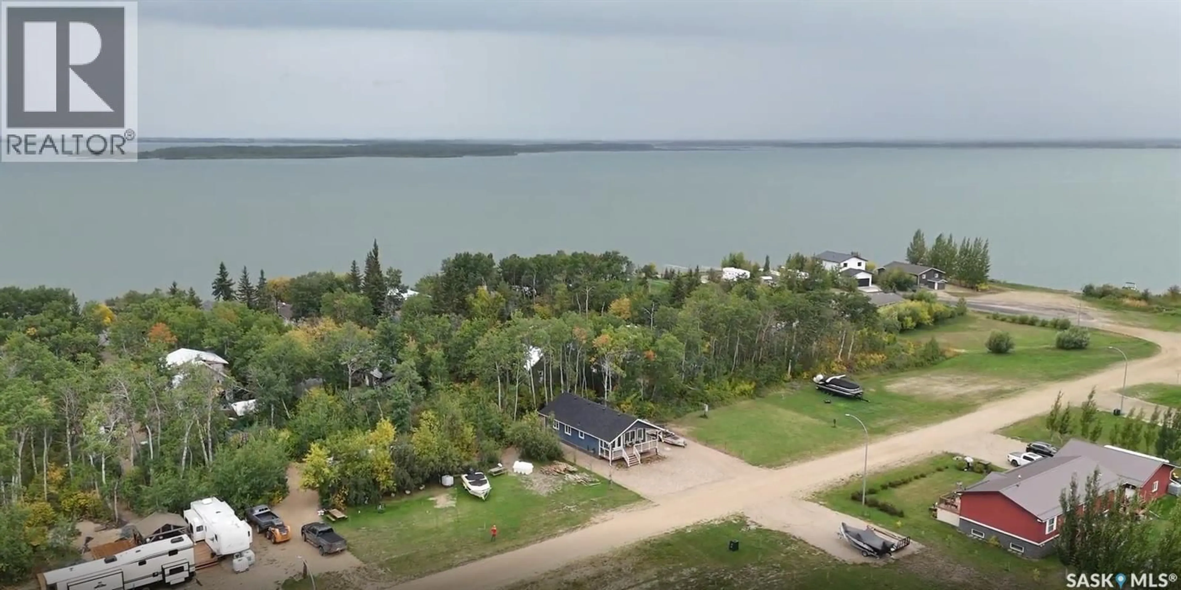 A pic from outside/outdoor area/front of a property/back of a property/a pic from drone, water/lake/river/ocean view for 105 PRINCE CRESCENT, Fishing Lake Saskatchewan S0A4T0