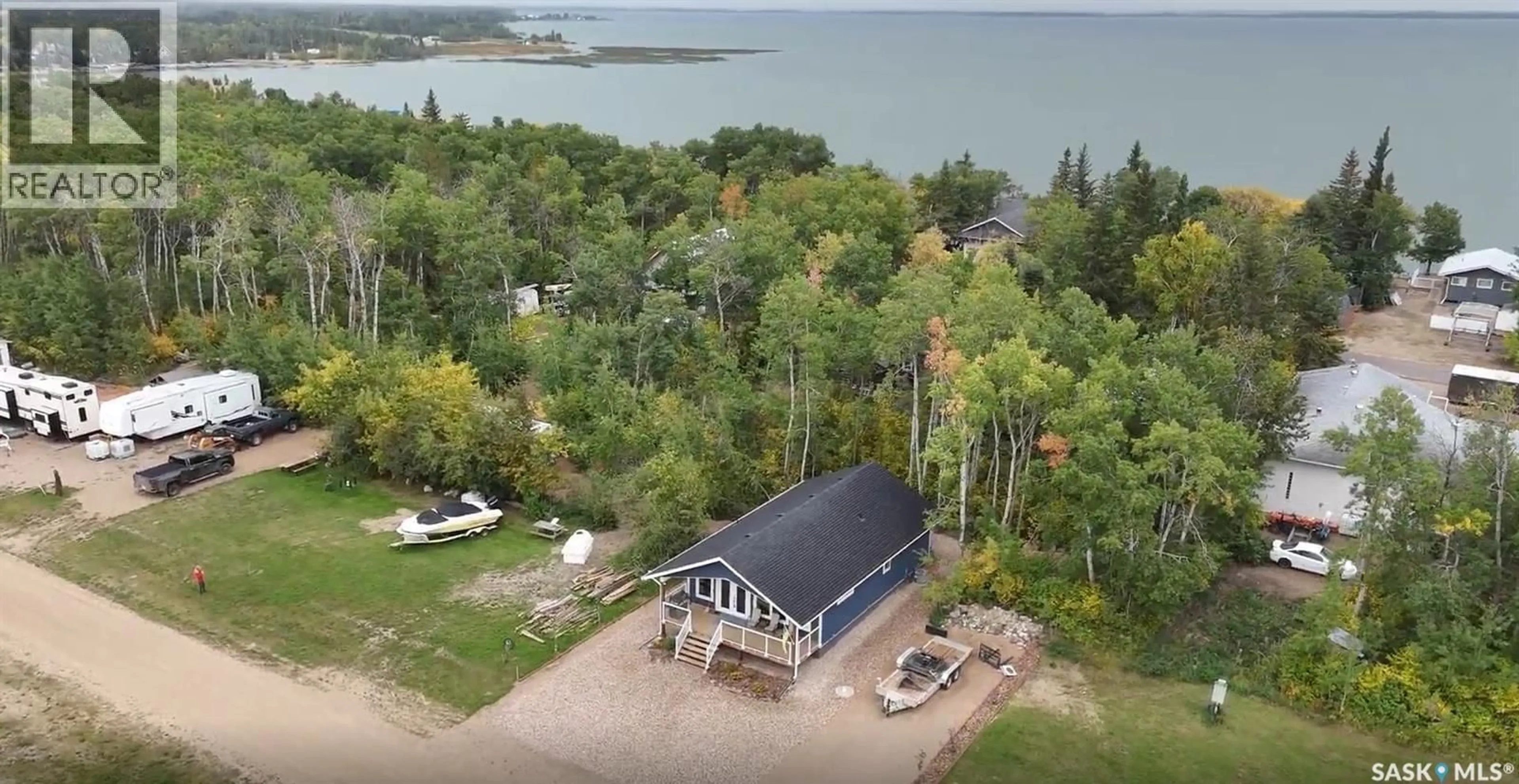 A pic from outside/outdoor area/front of a property/back of a property/a pic from drone, water/lake/river/ocean view for 105 PRINCE CRESCENT, Fishing Lake Saskatchewan S0A4T0