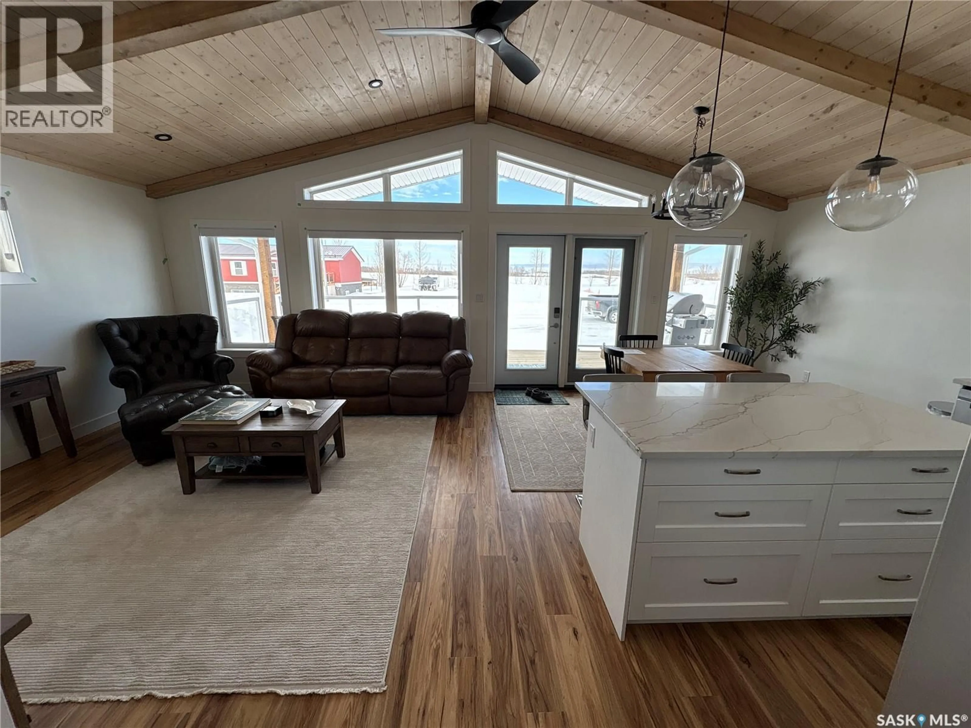 Living room with furniture, wood/laminate floor for 105 PRINCE CRESCENT, Fishing Lake Saskatchewan S0A4T0