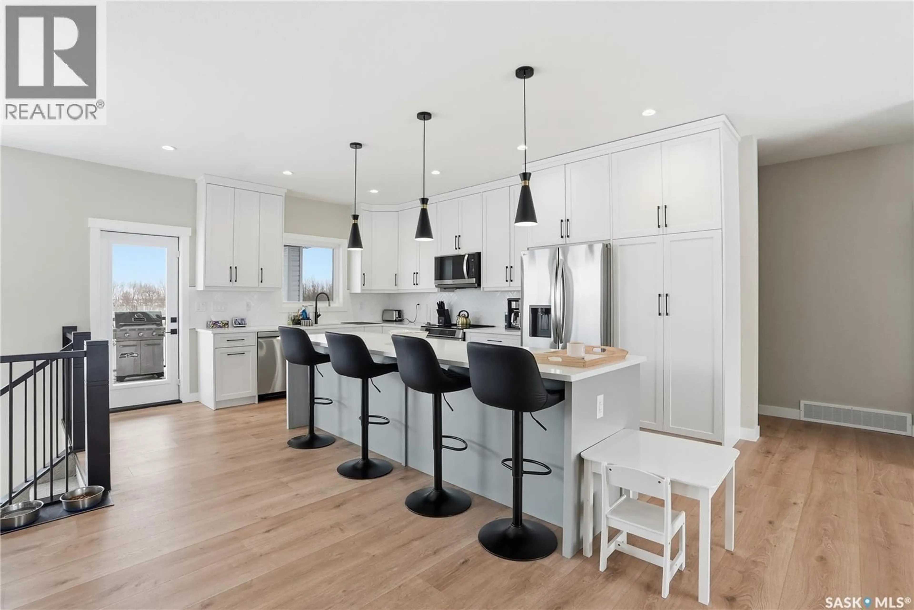 Open concept kitchen, unknown for 25 PHEASANT MEADOWS CRESCENT, Dundurn Rm No. 314 Saskatchewan S7C0C2