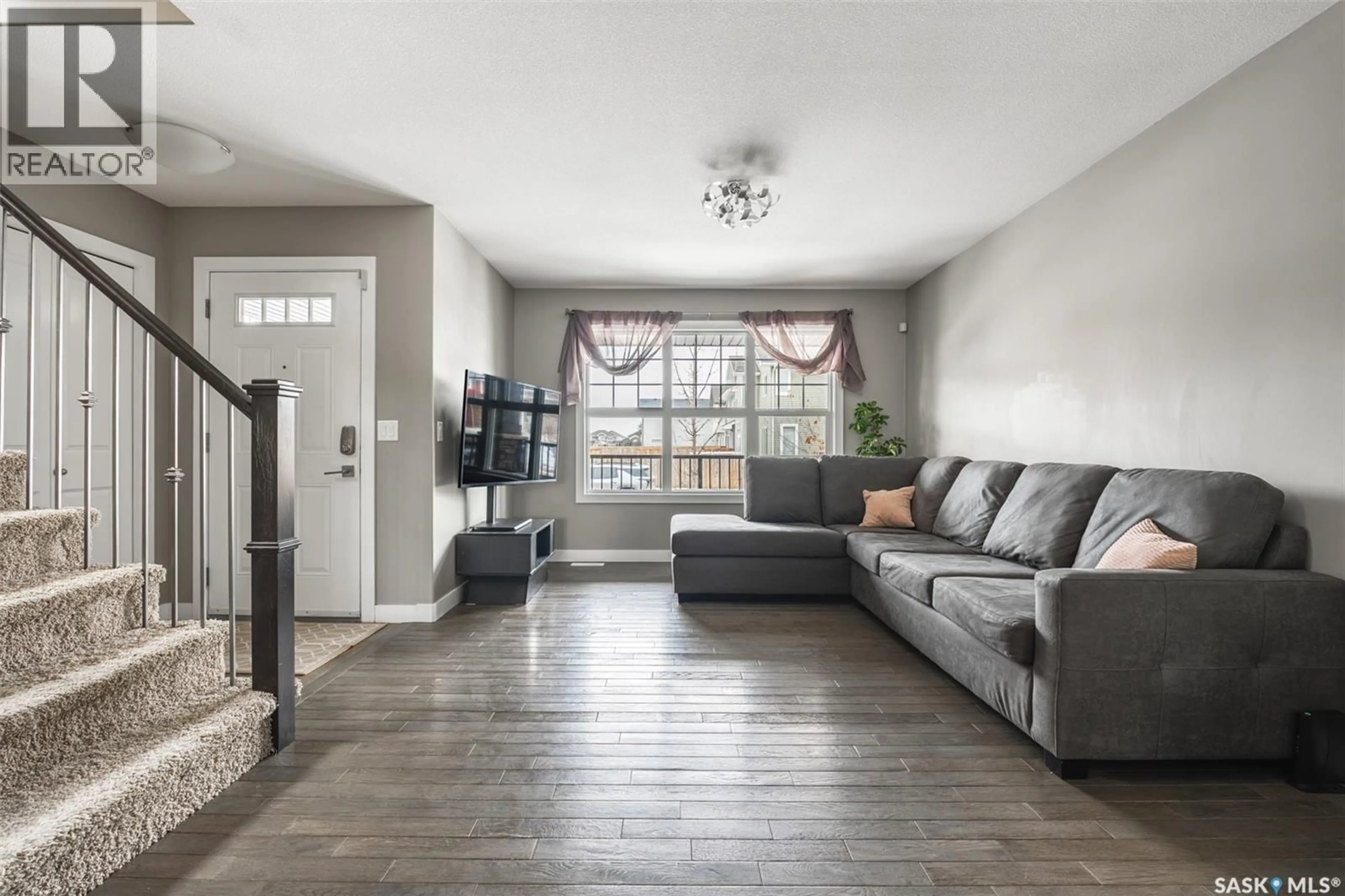 Living room with furniture, unknown for 158 CHILDERS CRESCENT, Saskatoon Saskatchewan S7L4L1