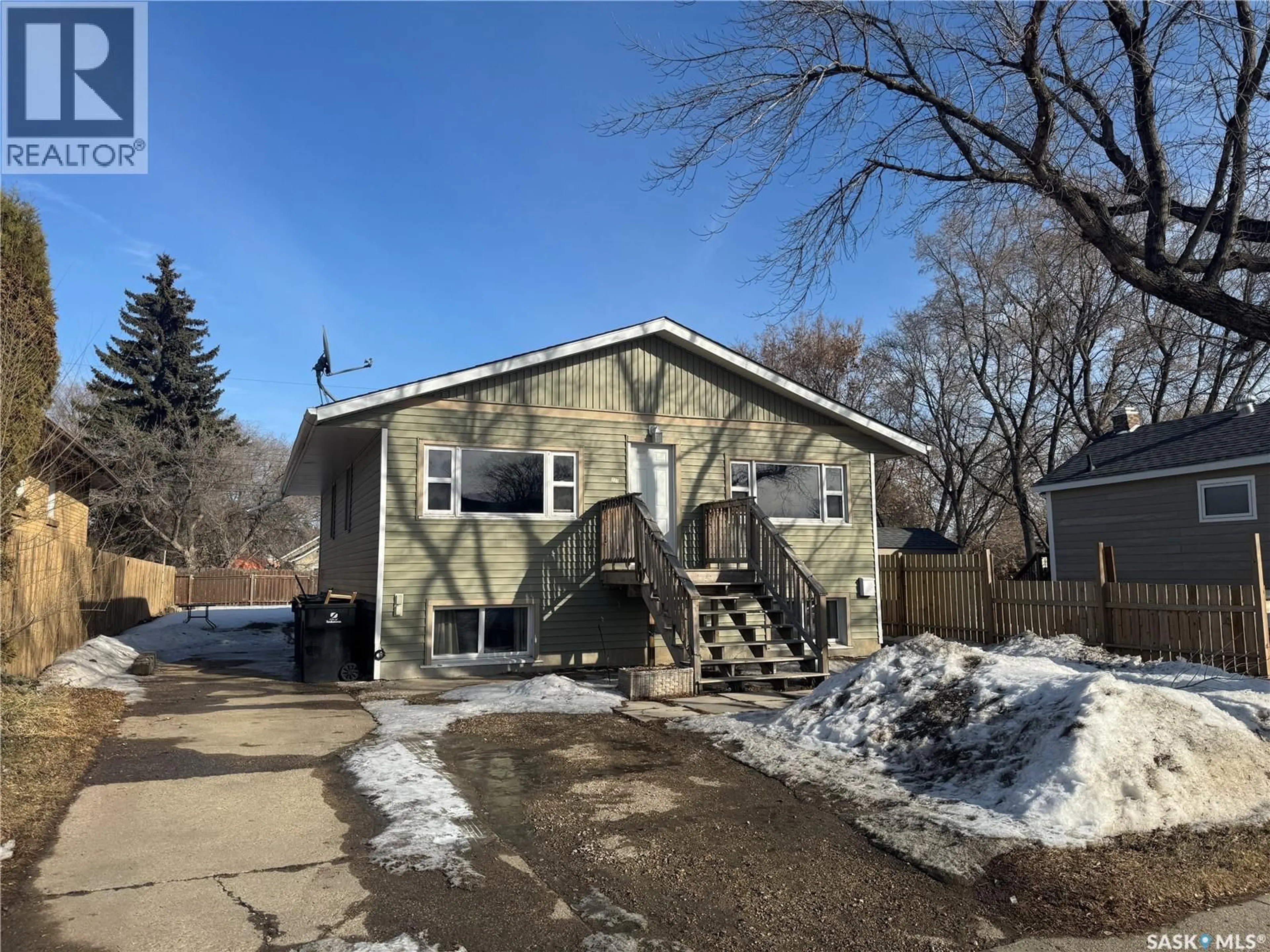 Home with vinyl exterior material, street for 322 WITNEY AVENUE, Saskatoon Saskatchewan S7M3K5