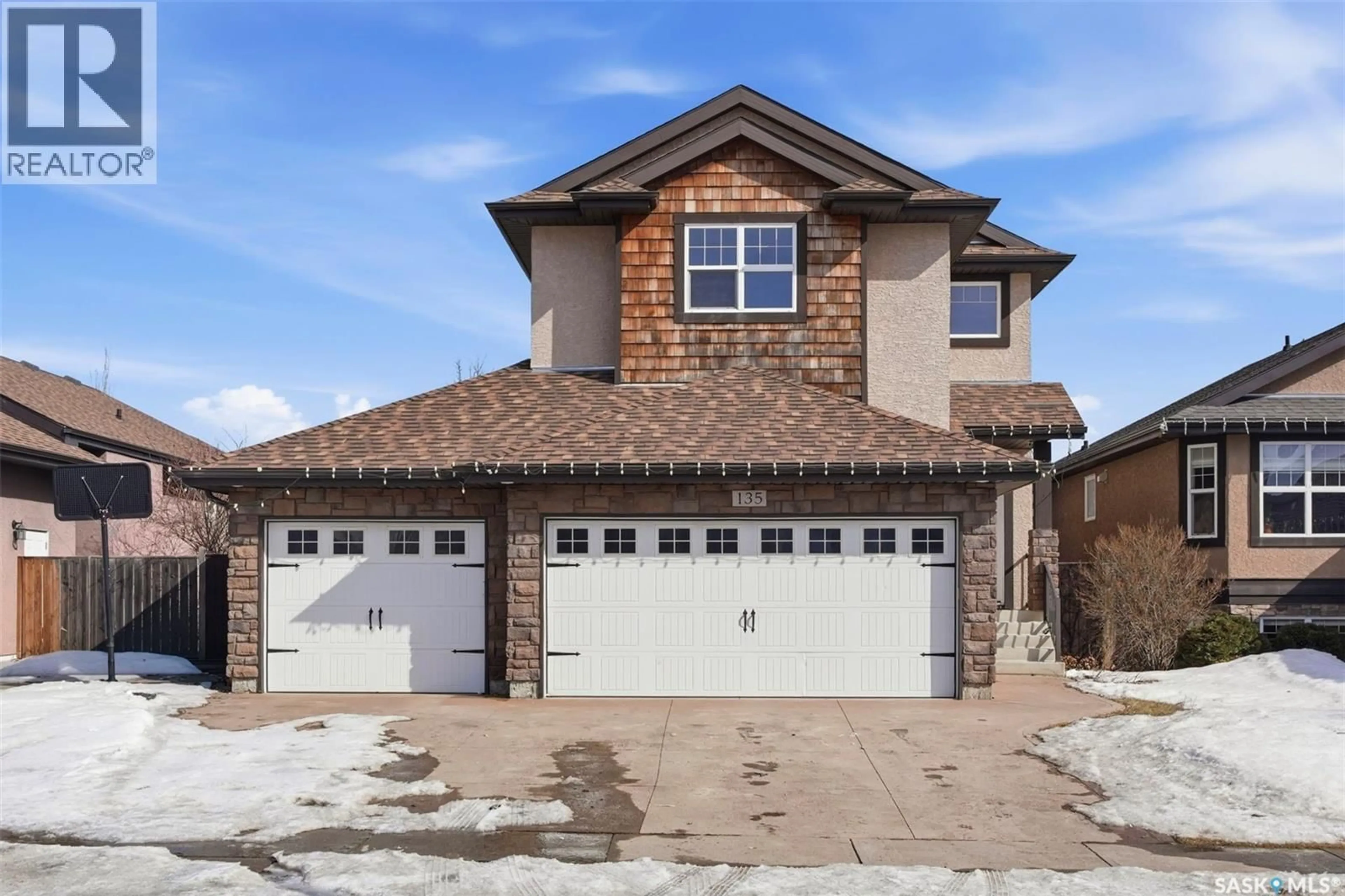 Home with brick exterior material, street for 135 BRAINERD CRESCENT, Saskatoon Saskatchewan S7T0H2