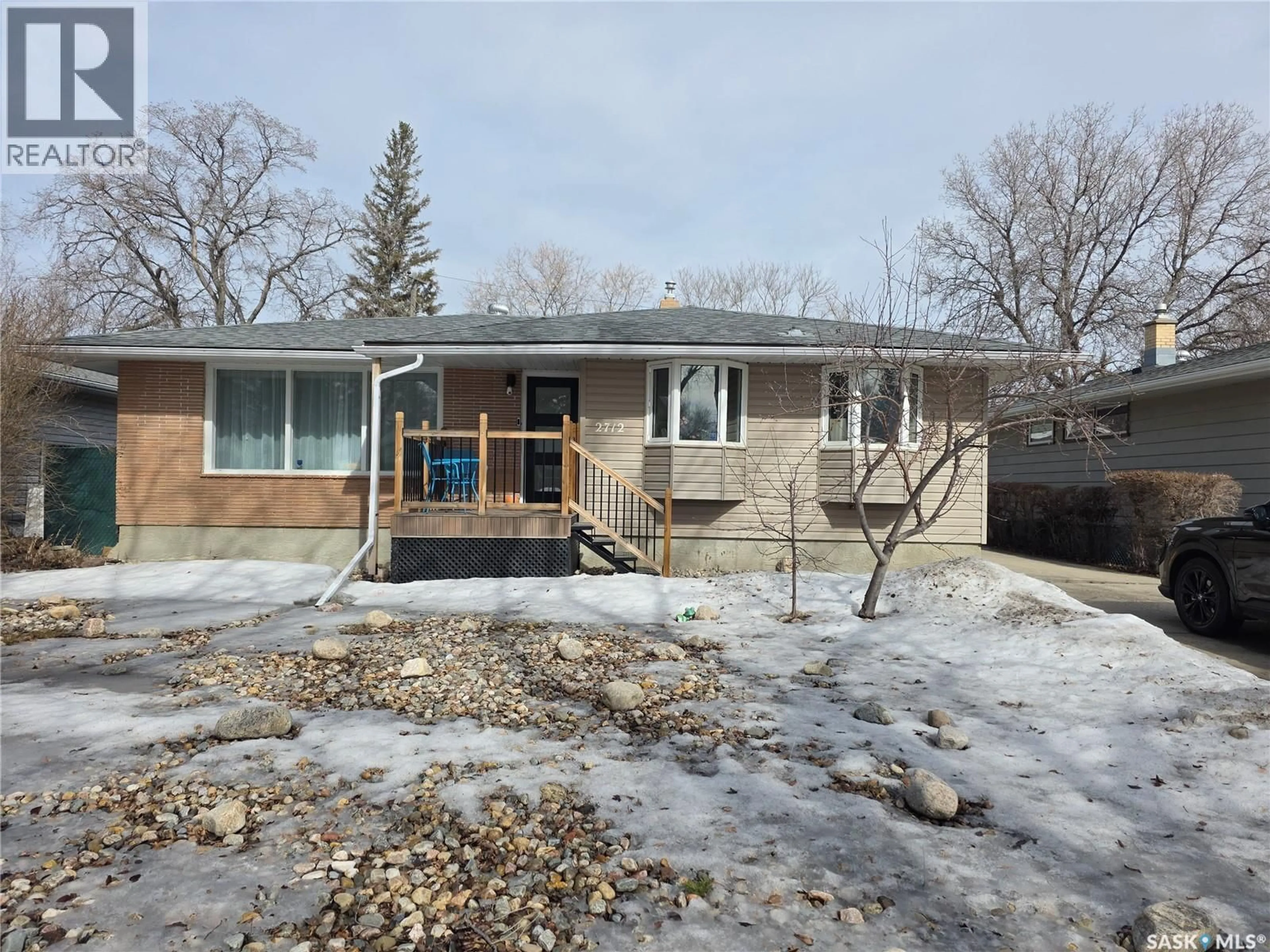 A pic from outside/outdoor area/front of a property/back of a property/a pic from drone, street for 2712 GRANT ROAD, Regina Saskatchewan S4S5T5