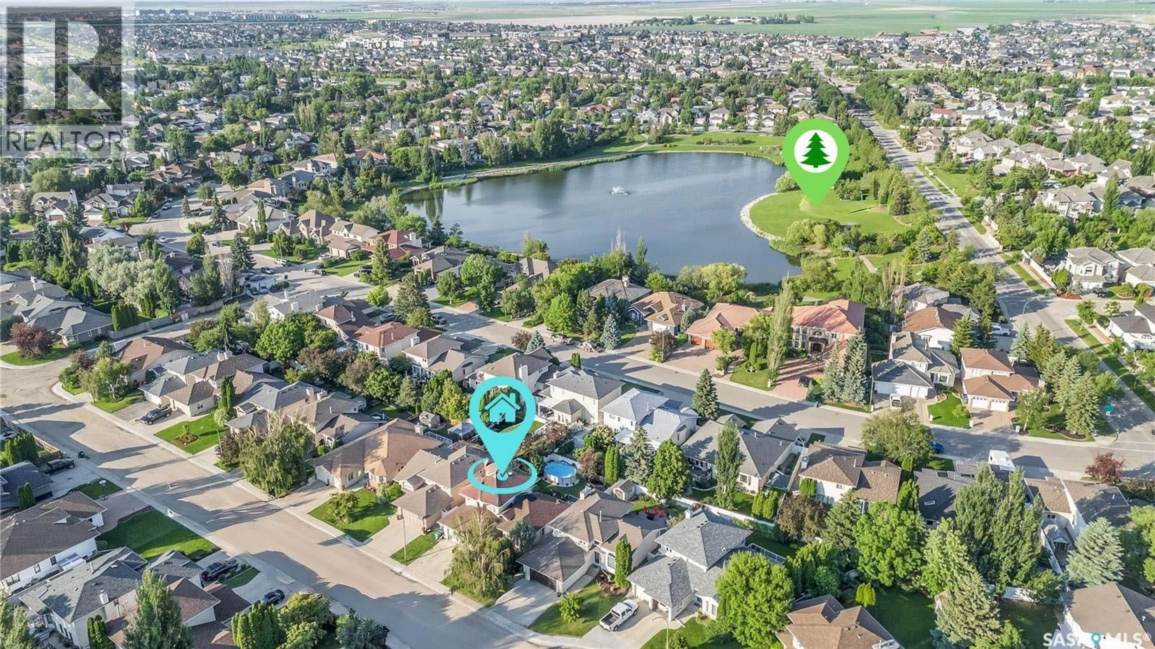 A pic from outside/outdoor area/front of a property/back of a property/a pic from drone, water/lake/river/ocean view for 1110 HURLEY WAY, Saskatoon Saskatchewan S7N4J7