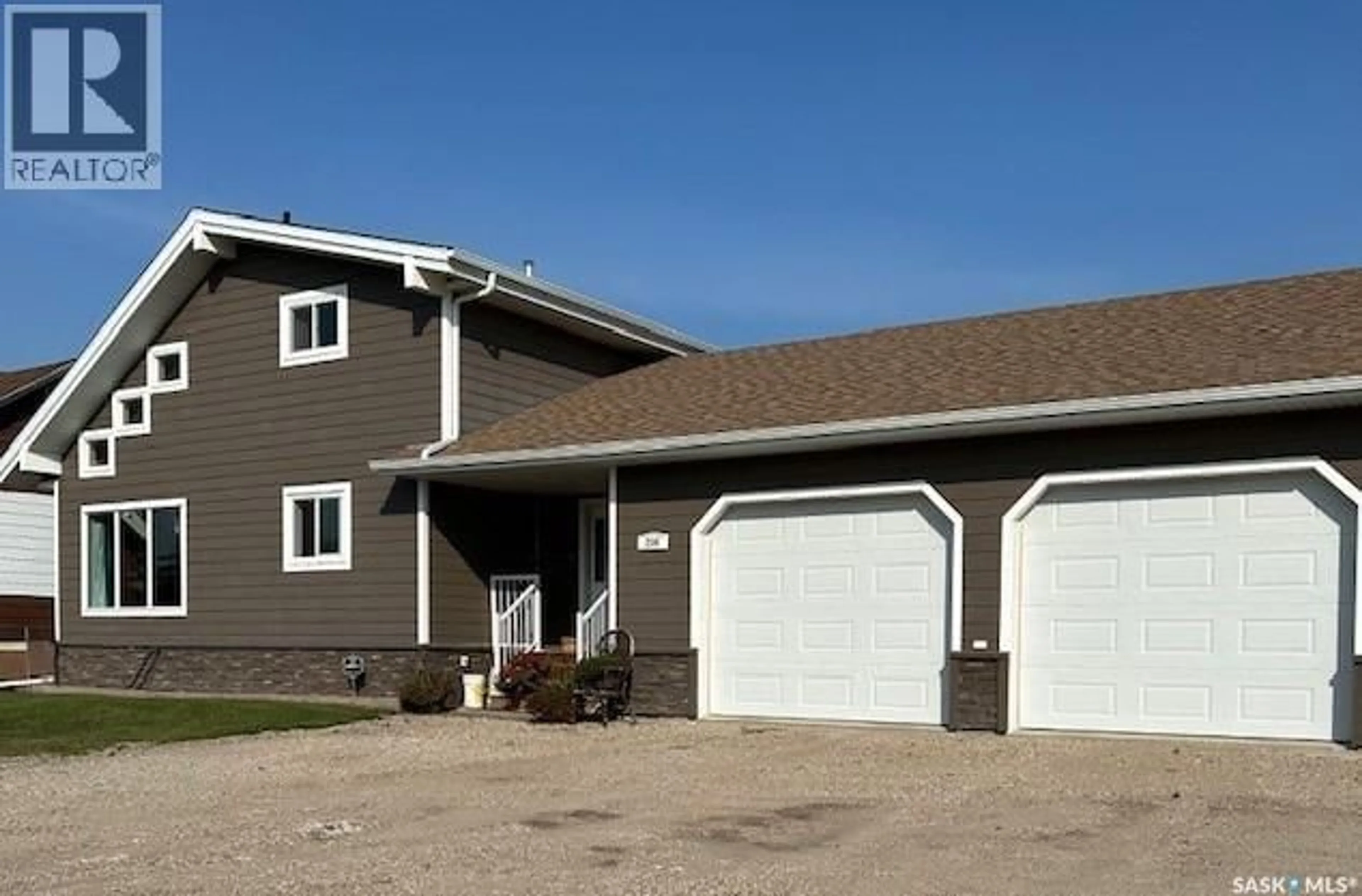 Home with vinyl exterior material, building for 206 2ND STREET, Carrot River Saskatchewan S0E0L0