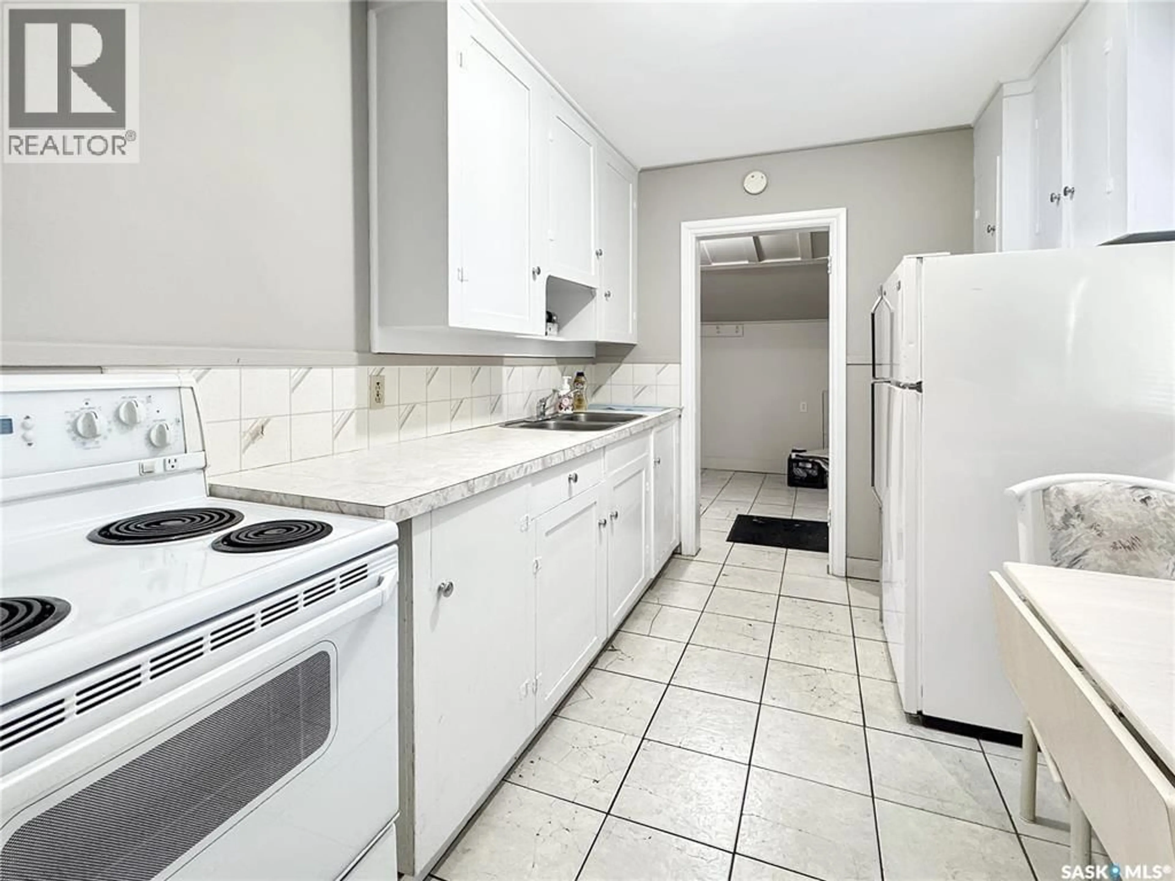 Standard kitchen, ceramic/tile floor for 1341 103RD STREET, North Battleford Saskatchewan S9A1K9