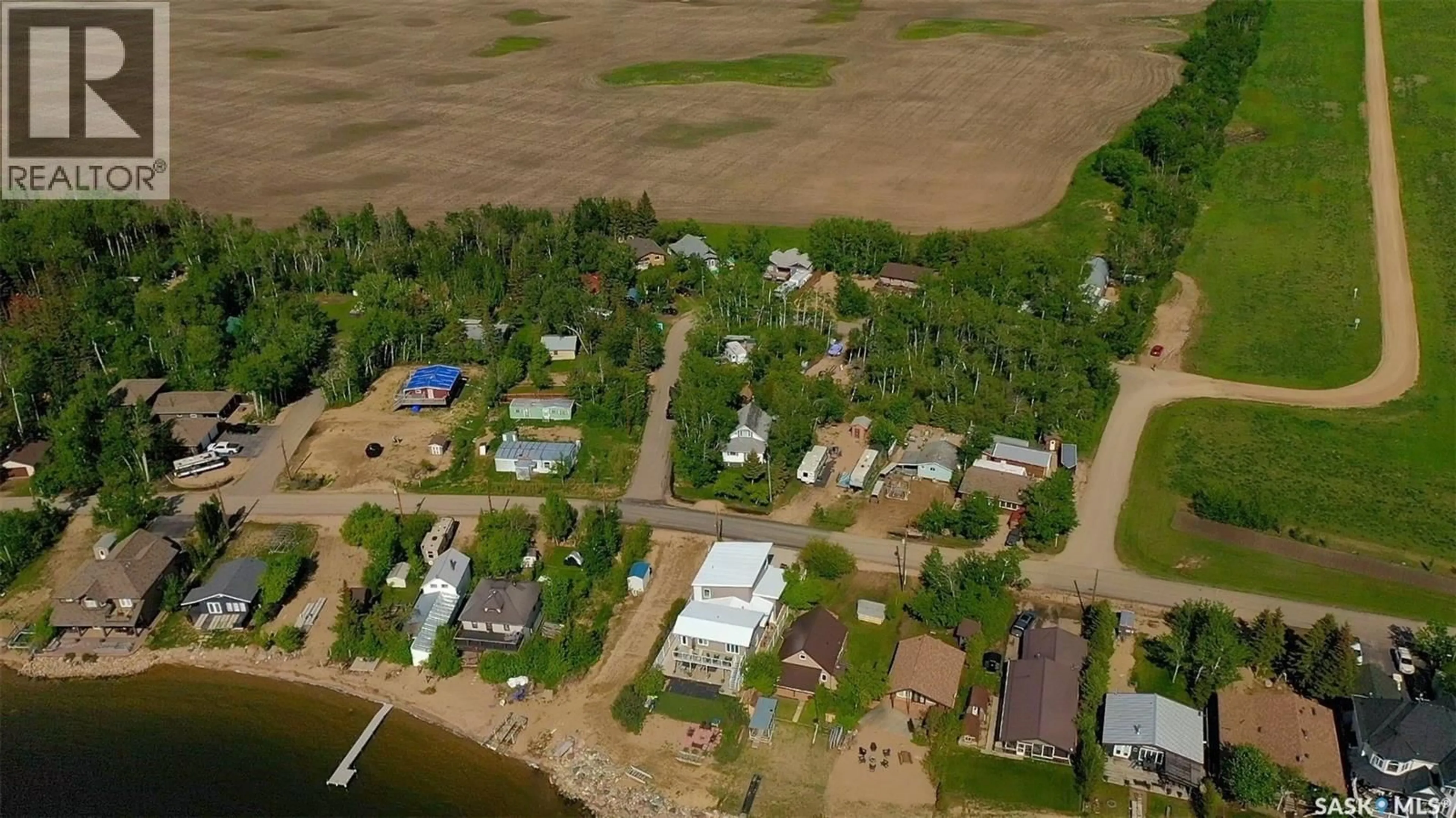 A pic from outside/outdoor area/front of a property/back of a property/a pic from drone, water/lake/river/ocean view for 15 KIM DAWN CRESCENT, Fishing Lake Saskatchewan S0A1Y0
