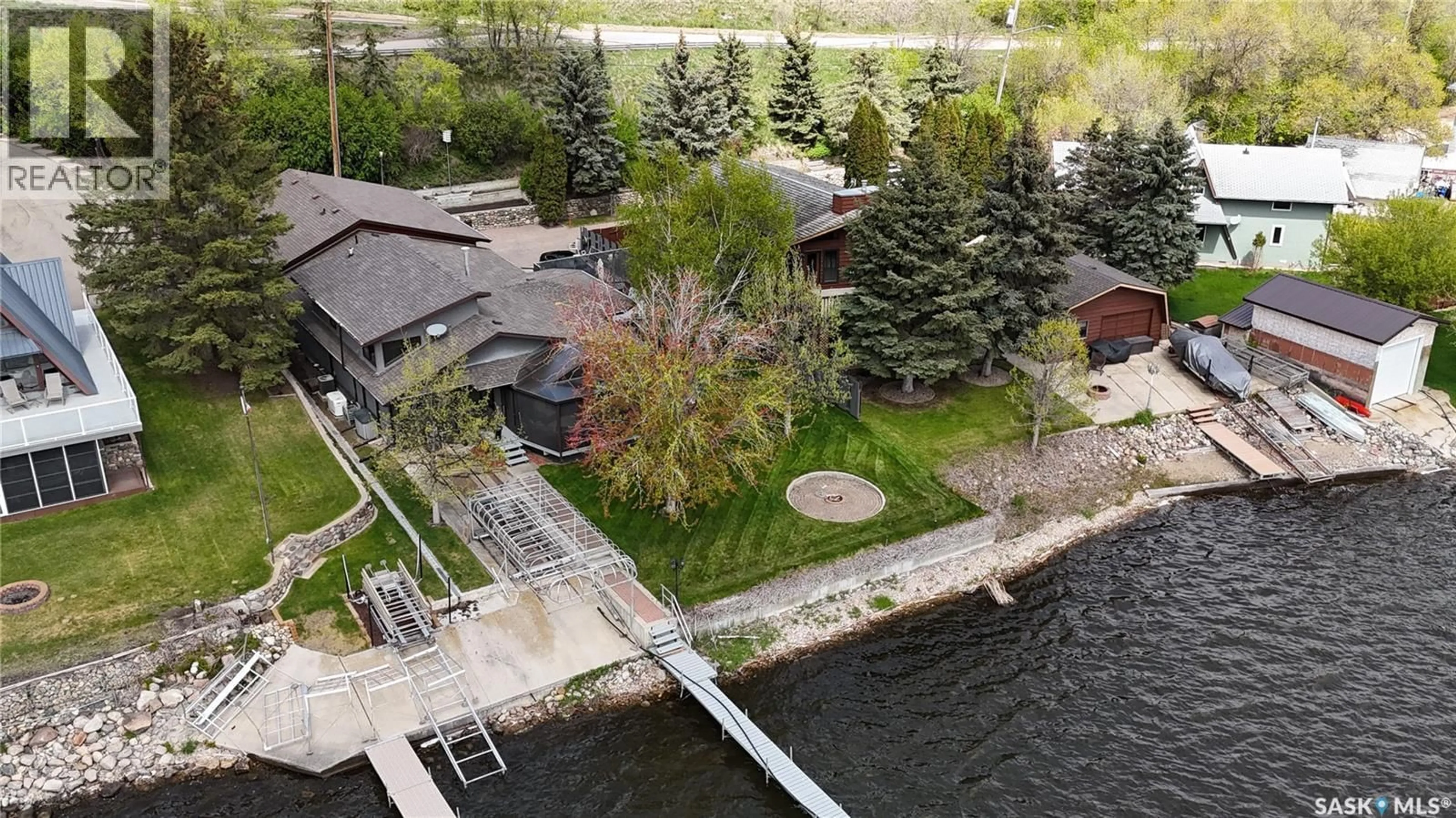 A pic from outside/outdoor area/front of a property/back of a property/a pic from drone, water/lake/river/ocean view for 52 PASQUA LAKE ROAD, North Qu'Appelle Rm No. 187 Saskatchewan S0G1S0