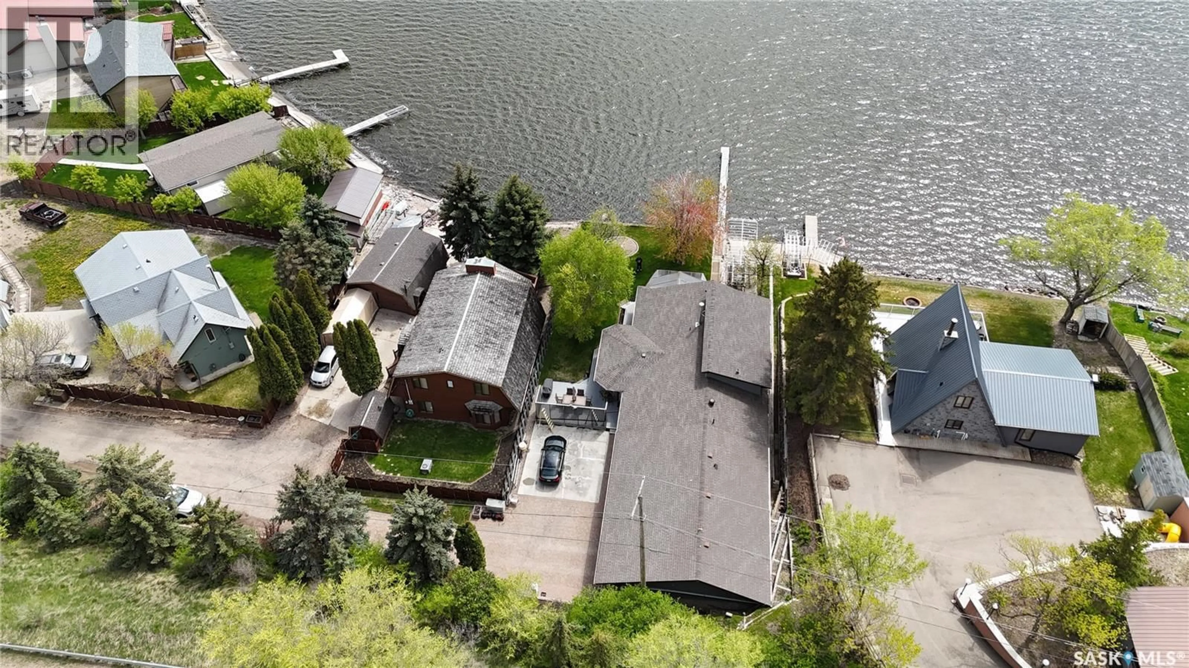 A pic from outside/outdoor area/front of a property/back of a property/a pic from drone, water/lake/river/ocean view for 52 PASQUA LAKE ROAD, North Qu'Appelle Rm No. 187 Saskatchewan S0G1S0