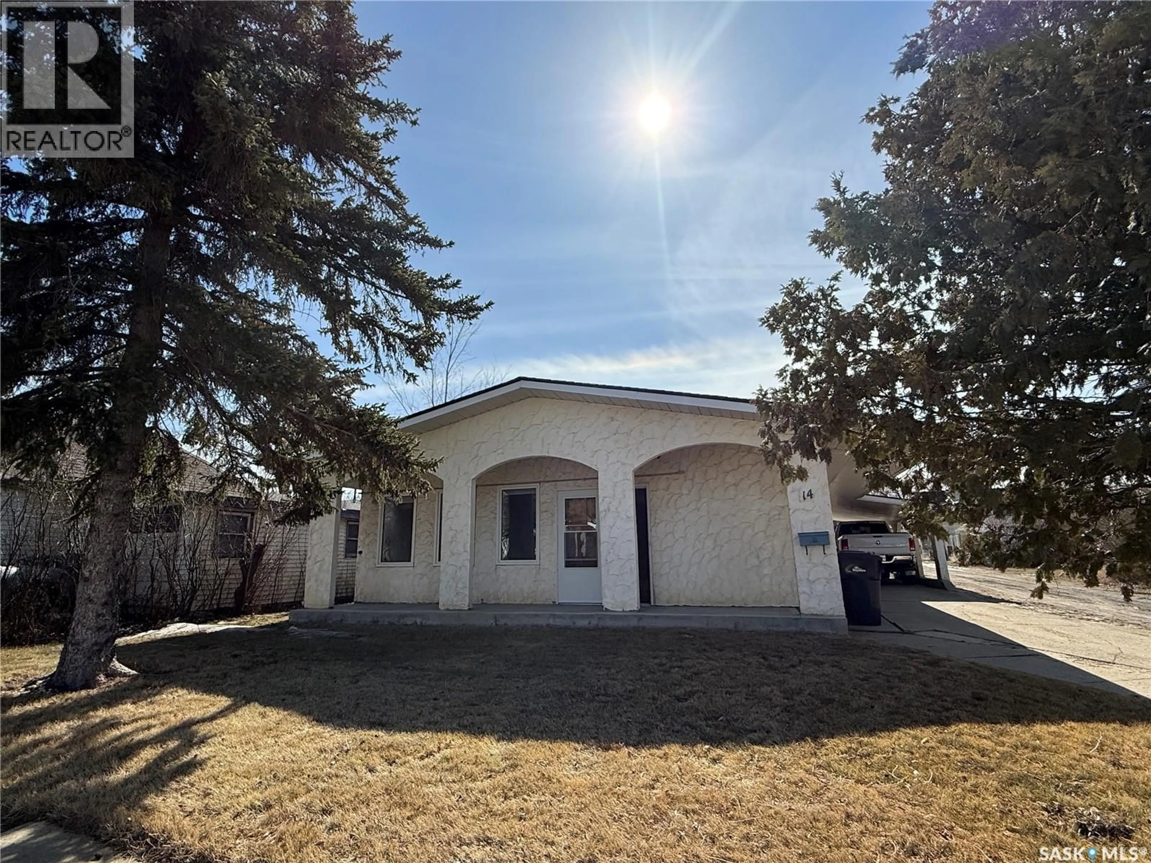 Home with vinyl exterior material, street for 14 2ND AVENUE, Weyburn Saskatchewan S4H1W8