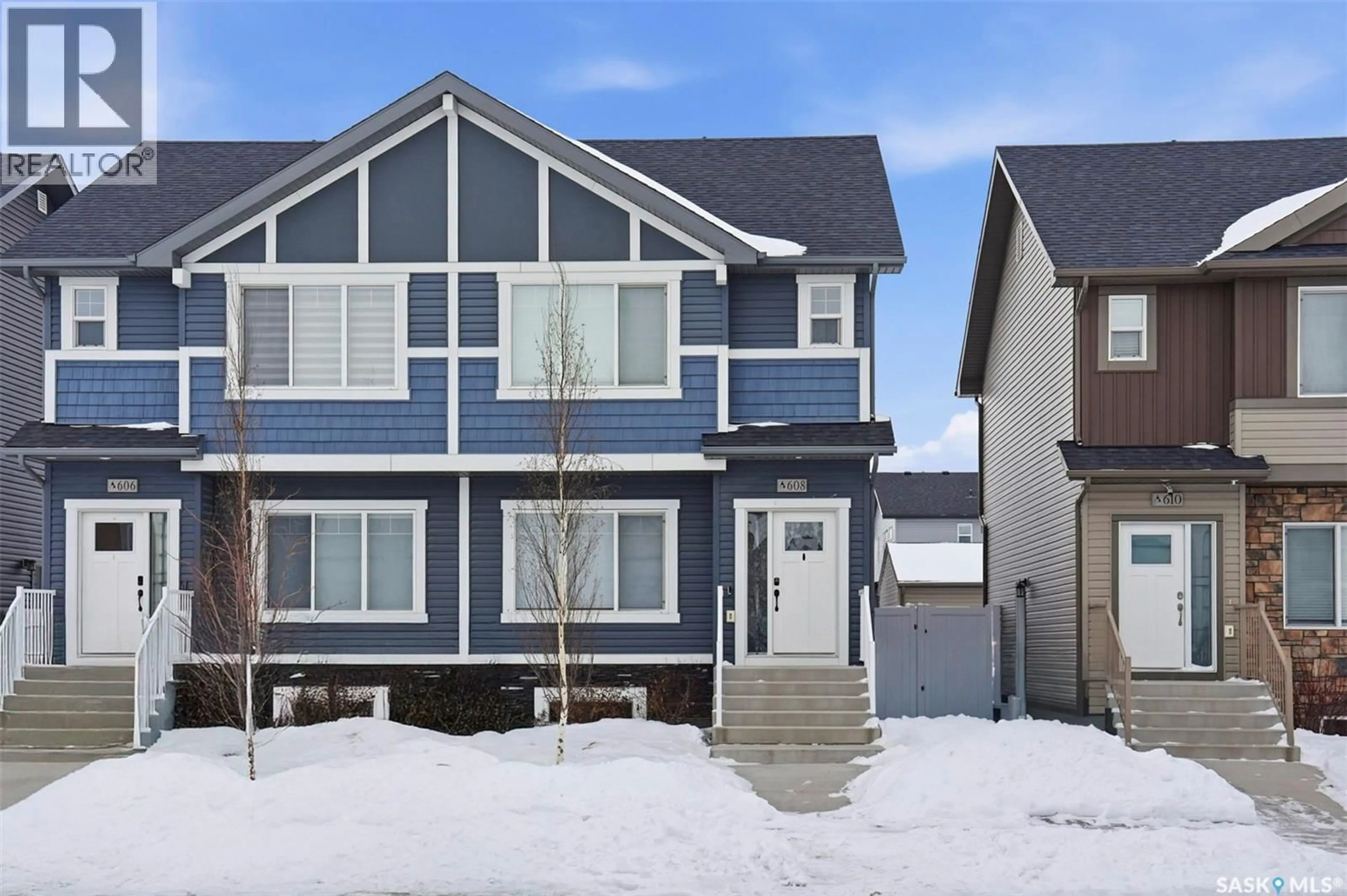 Home with vinyl exterior material, street for 608 BRIGHTON GATE, Saskatoon Saskatchewan S7V0V5