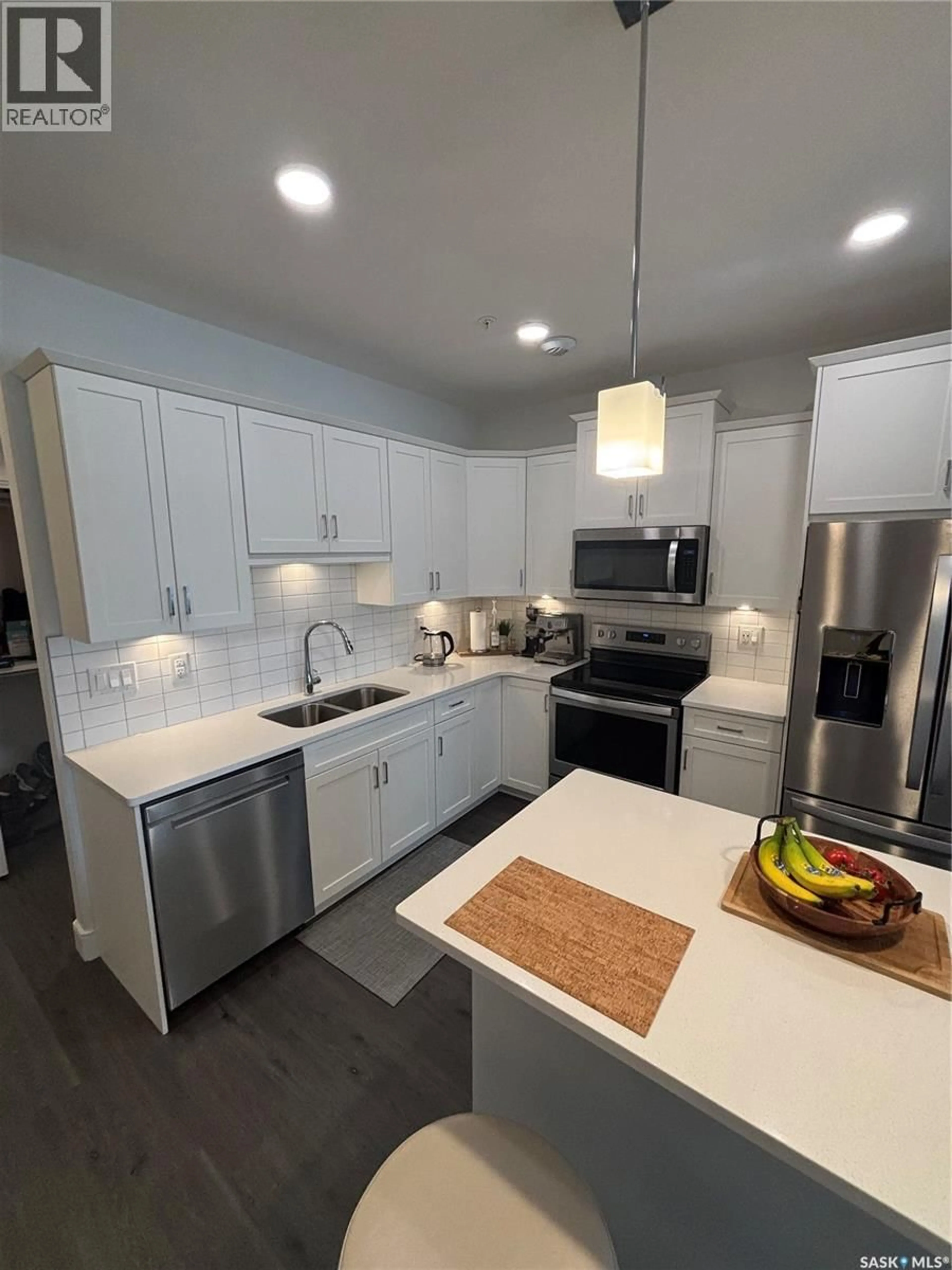 Open concept kitchen, ceramic/tile floor for 105 - 113 WILLIS CRESCENT, Saskatoon Saskatchewan S7T0Z3