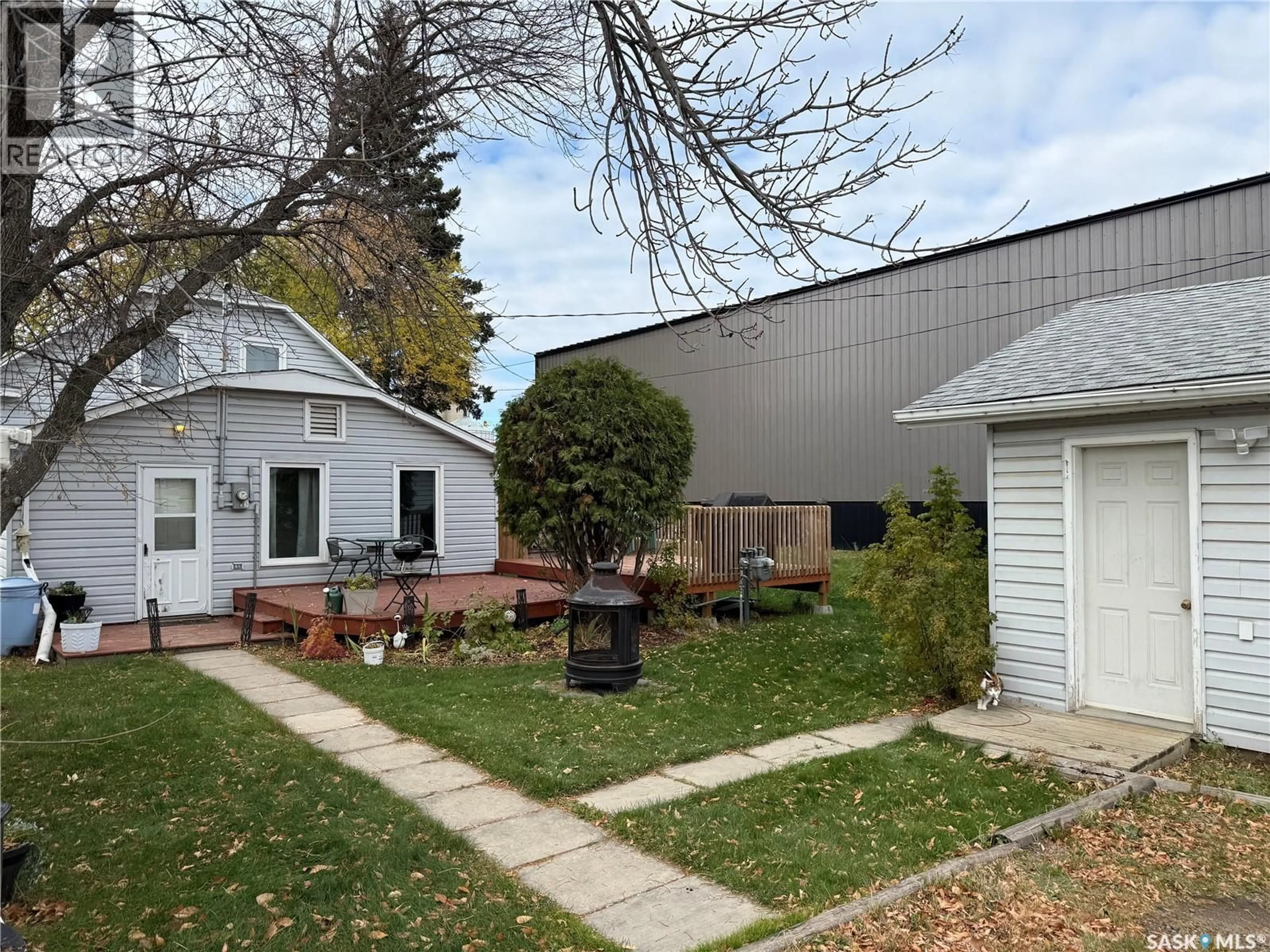 A pic from outside/outdoor area/front of a property/back of a property/a pic from drone, street for 109 2ND STREET, Spiritwood Saskatchewan S0J2M0