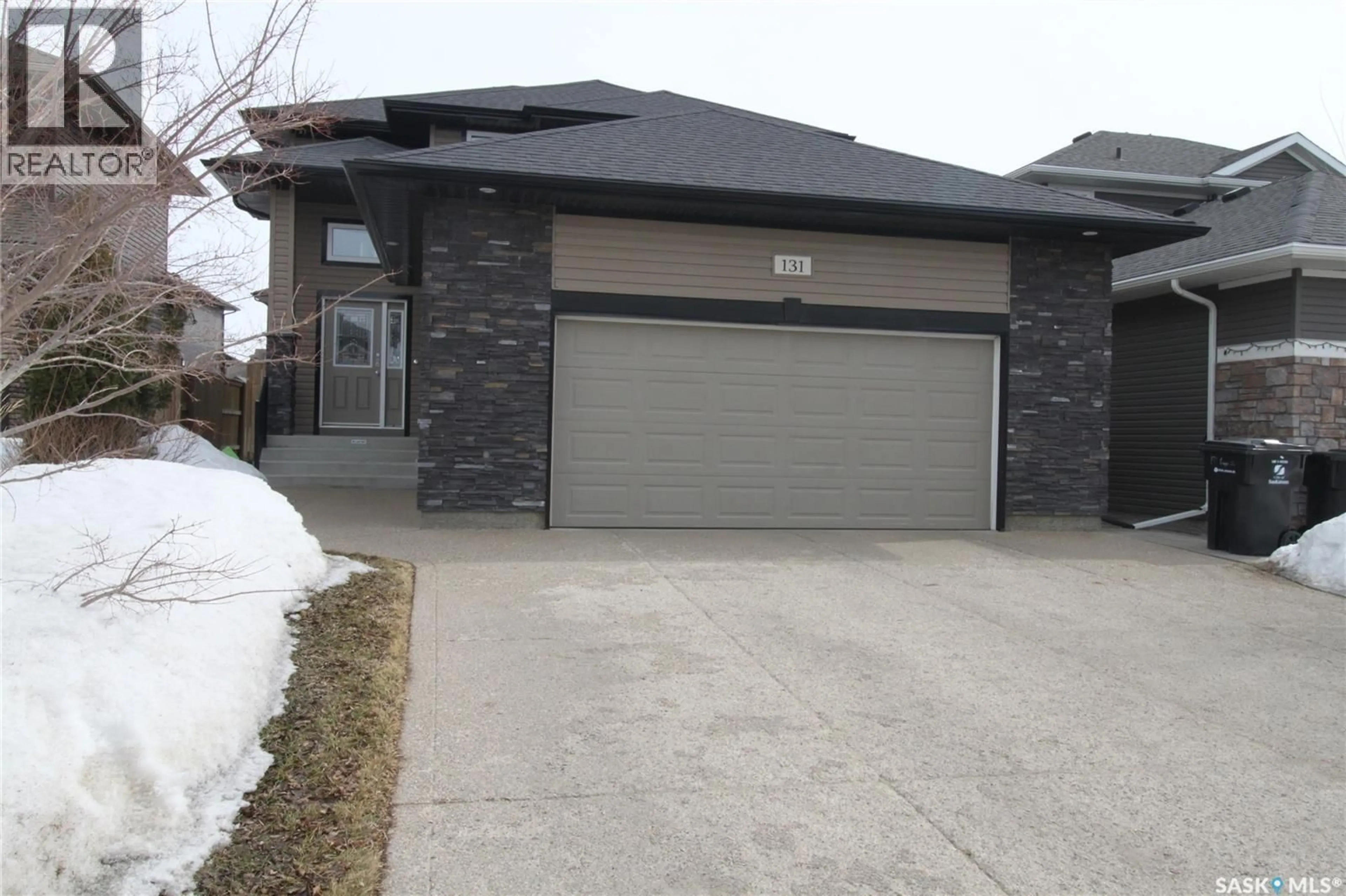 Home with brick exterior material, street for 131 PRINGLE CRESCENT, Saskatoon Saskatchewan S7T0S3