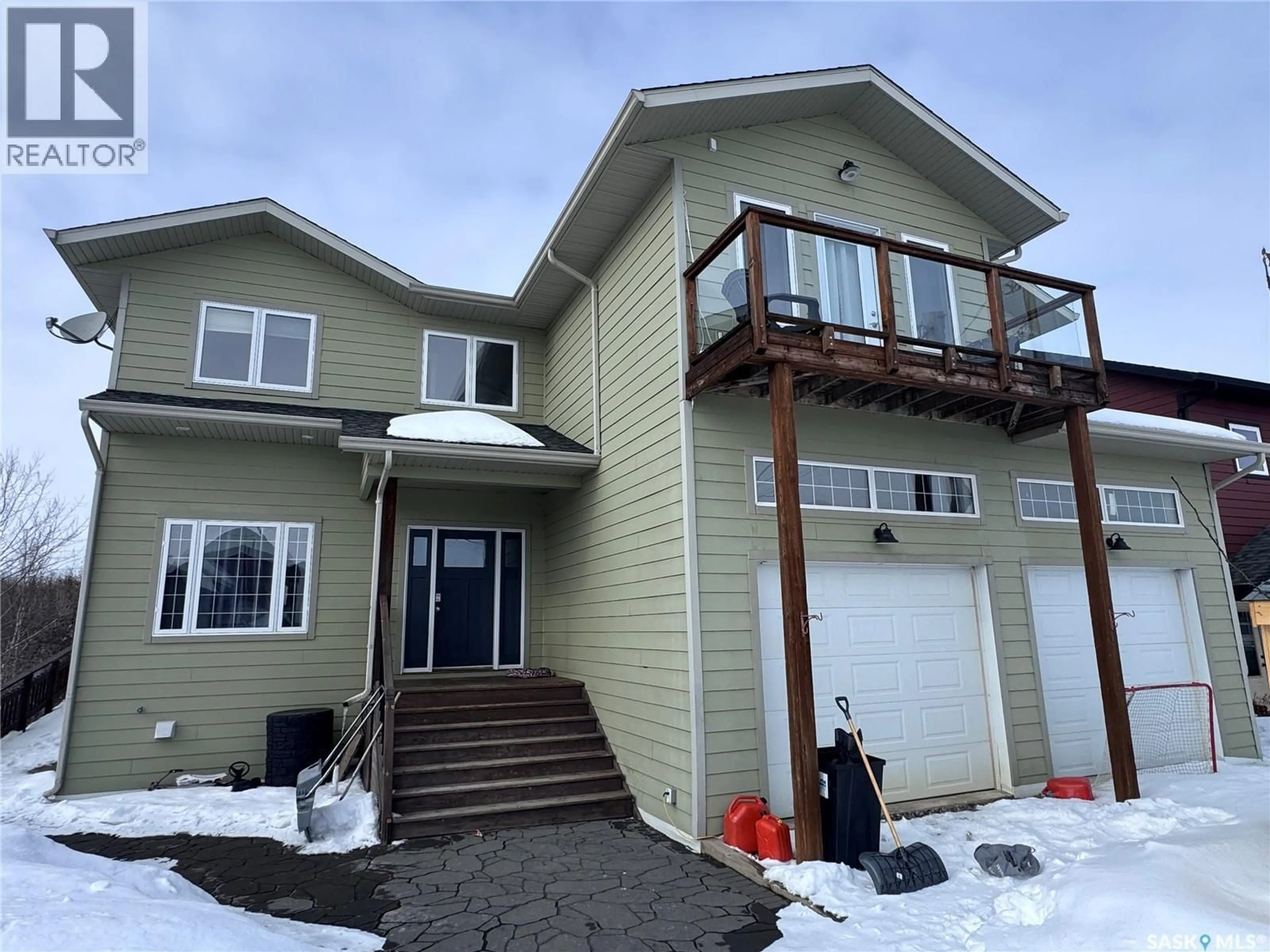 Home with vinyl exterior material, street for 237 EAGLE POINT DRIVE, La Ronge Saskatchewan S0J1L0