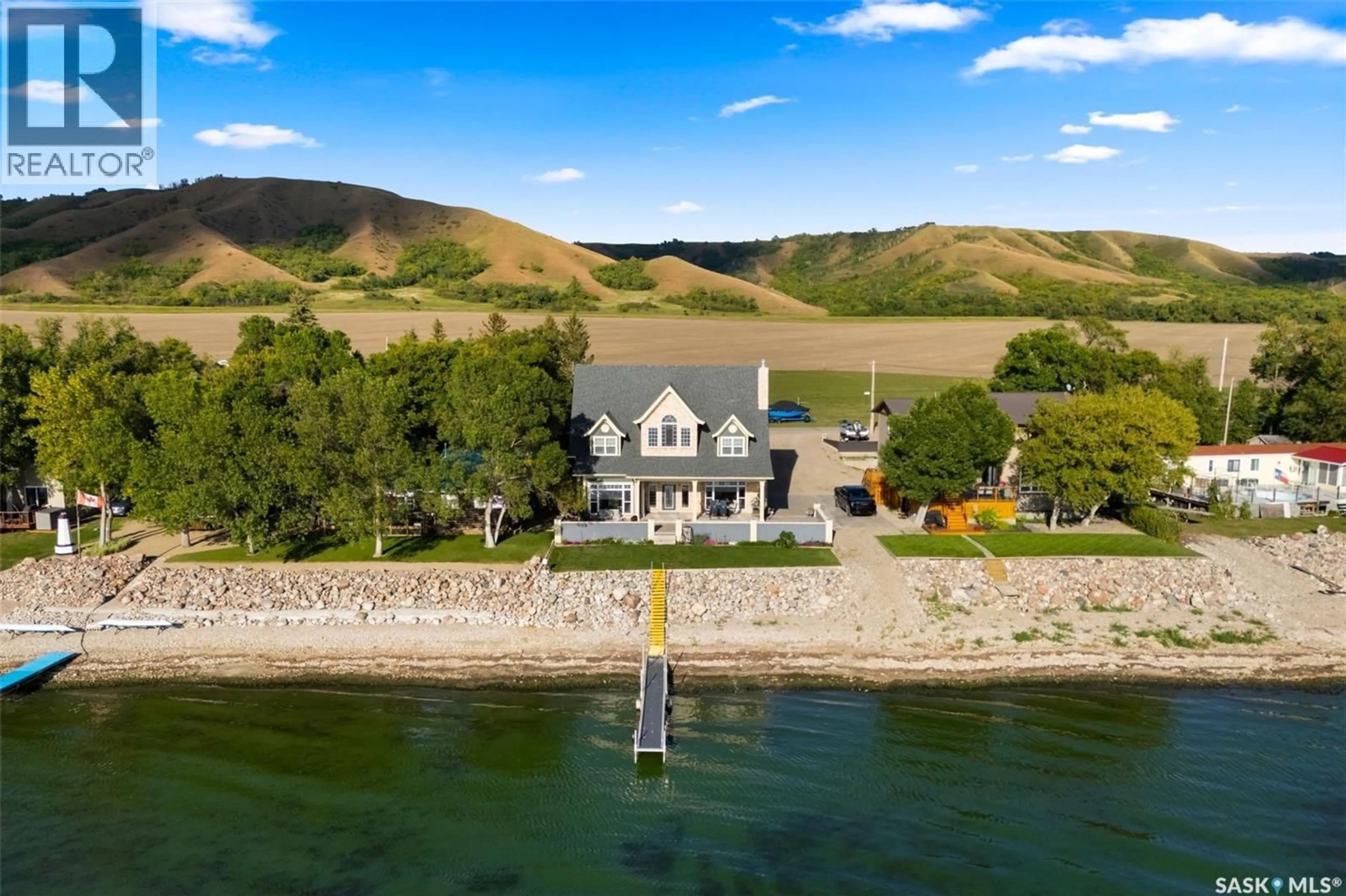 A pic from outside/outdoor area/front of a property/back of a property/a pic from drone, water/lake/river/ocean view for 307A CURRIE AVENUE, Round Lake Saskatchewan S0A3Y0