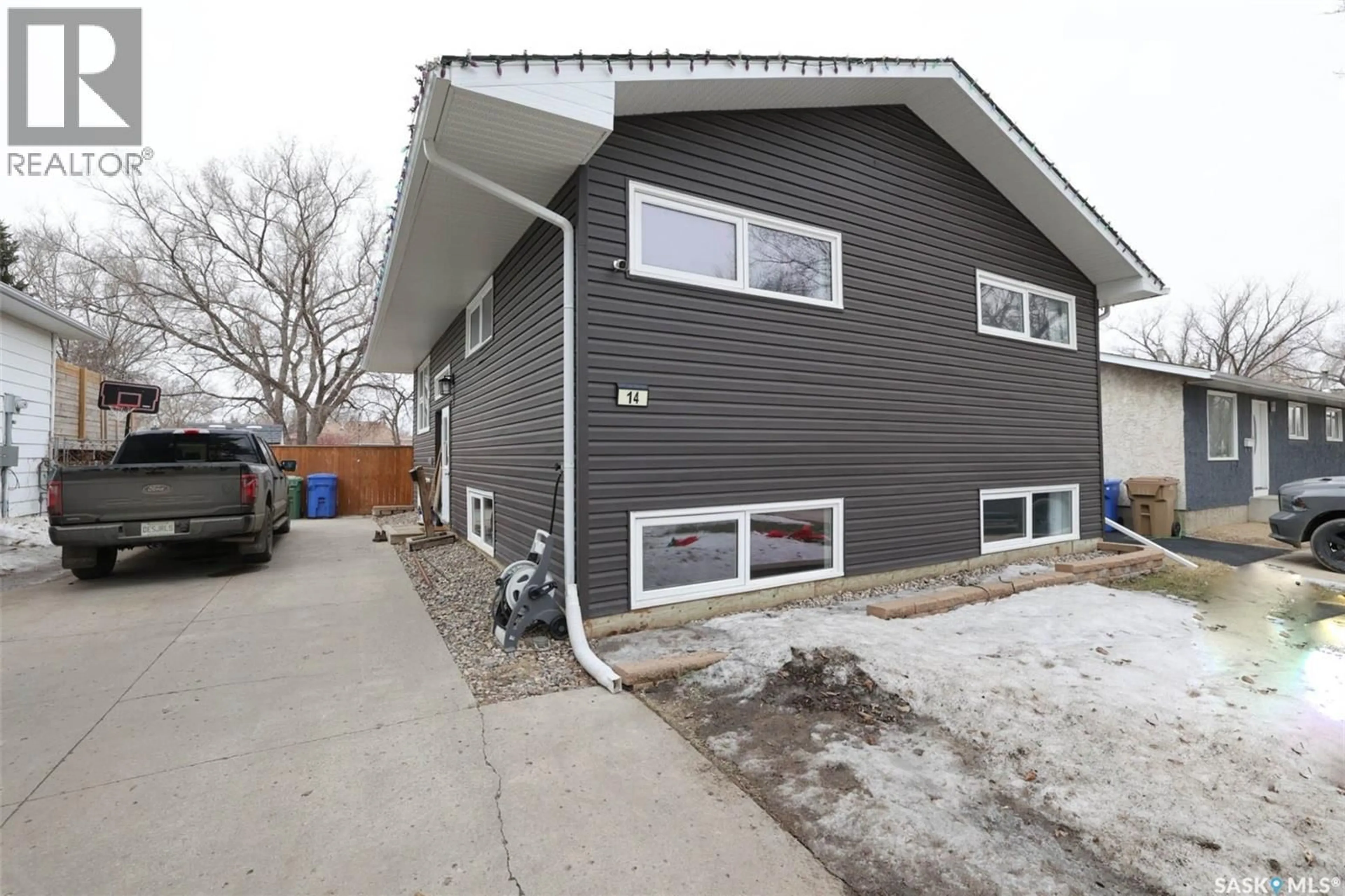 Home with vinyl exterior material, street for 14 BOUCHER CRESCENT, Regina Saskatchewan S4R7E3