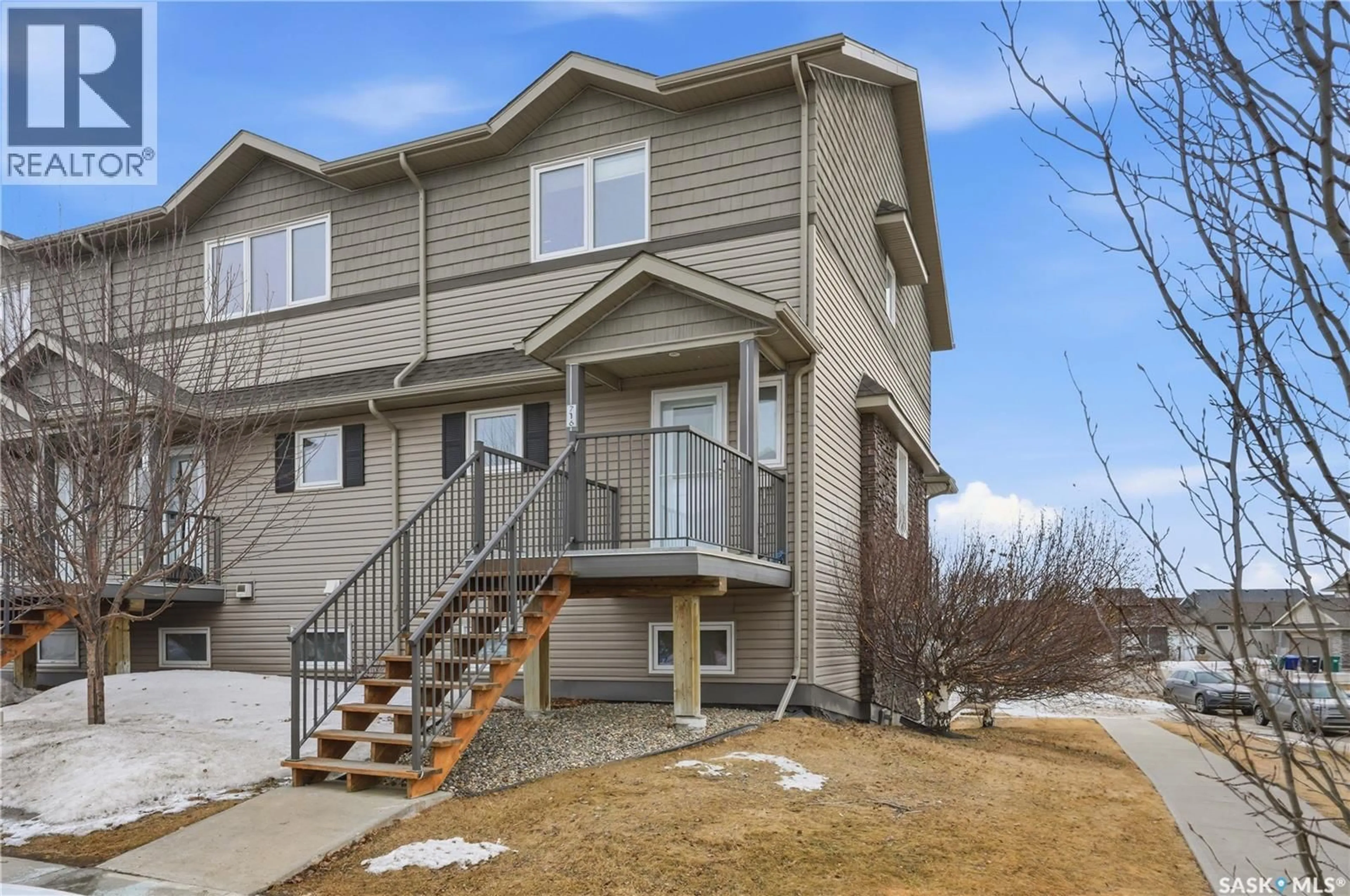 Home with vinyl exterior material, street for 1303 - 716 RICHARDSON ROAD, Saskatoon Saskatchewan S7R0L1