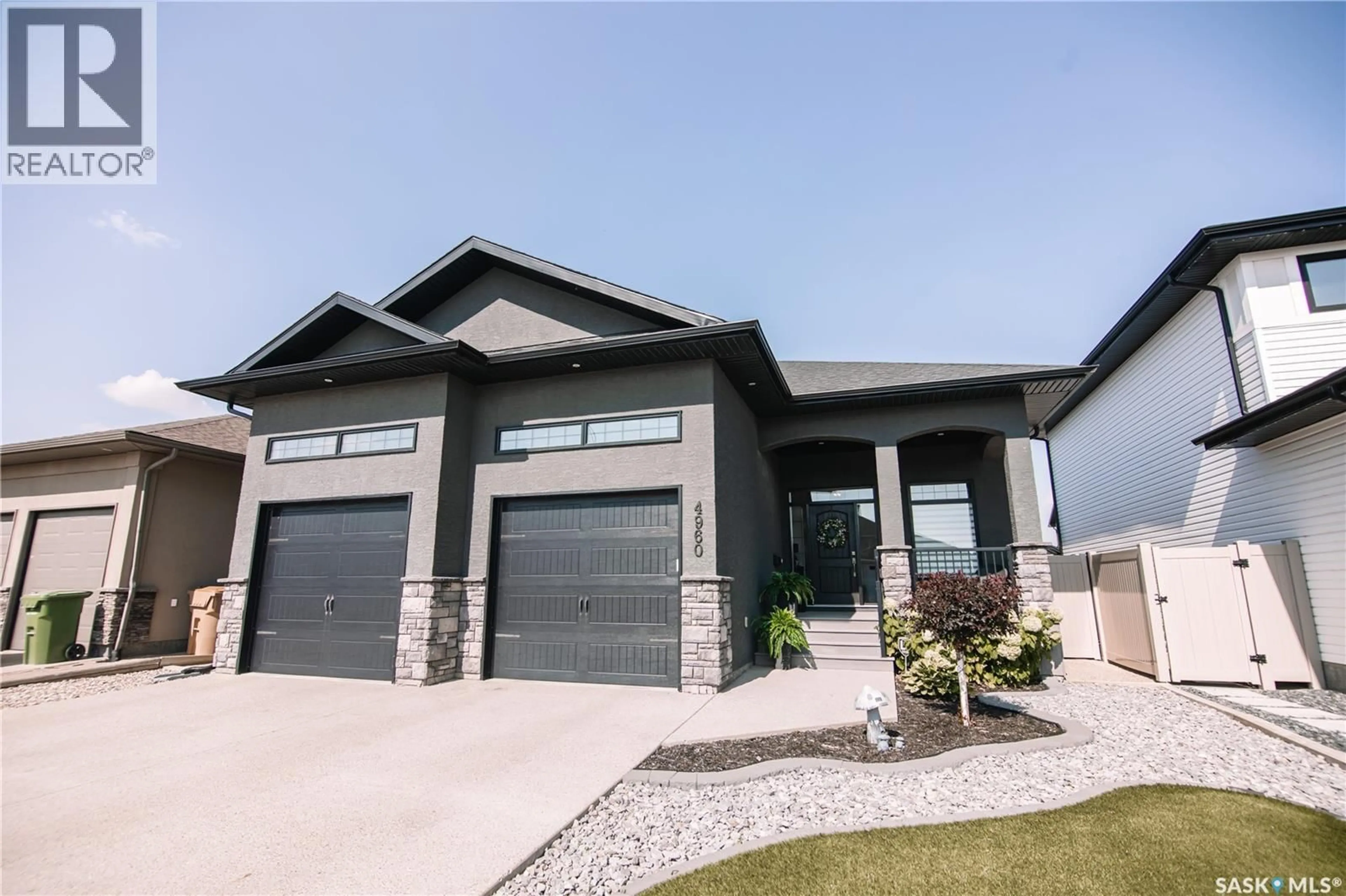 Home with vinyl exterior material, street for 4960 WRIGHT ROAD, Regina Saskatchewan S4W0B1