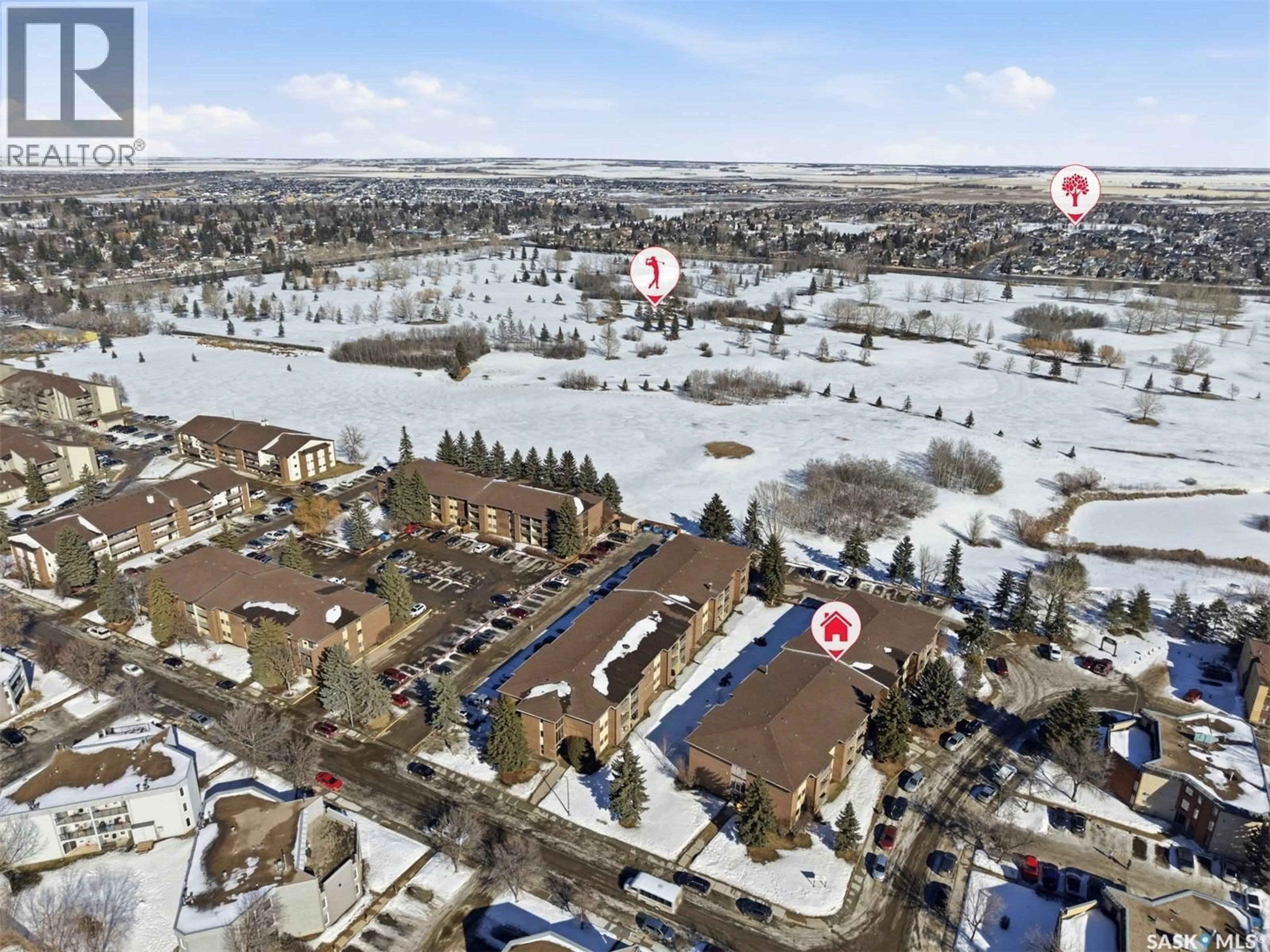 A pic from outside/outdoor area/front of a property/back of a property/a pic from drone, water/lake/river/ocean view for 403 - 306 TAIT COURT, Saskatoon Saskatchewan S7H5L3