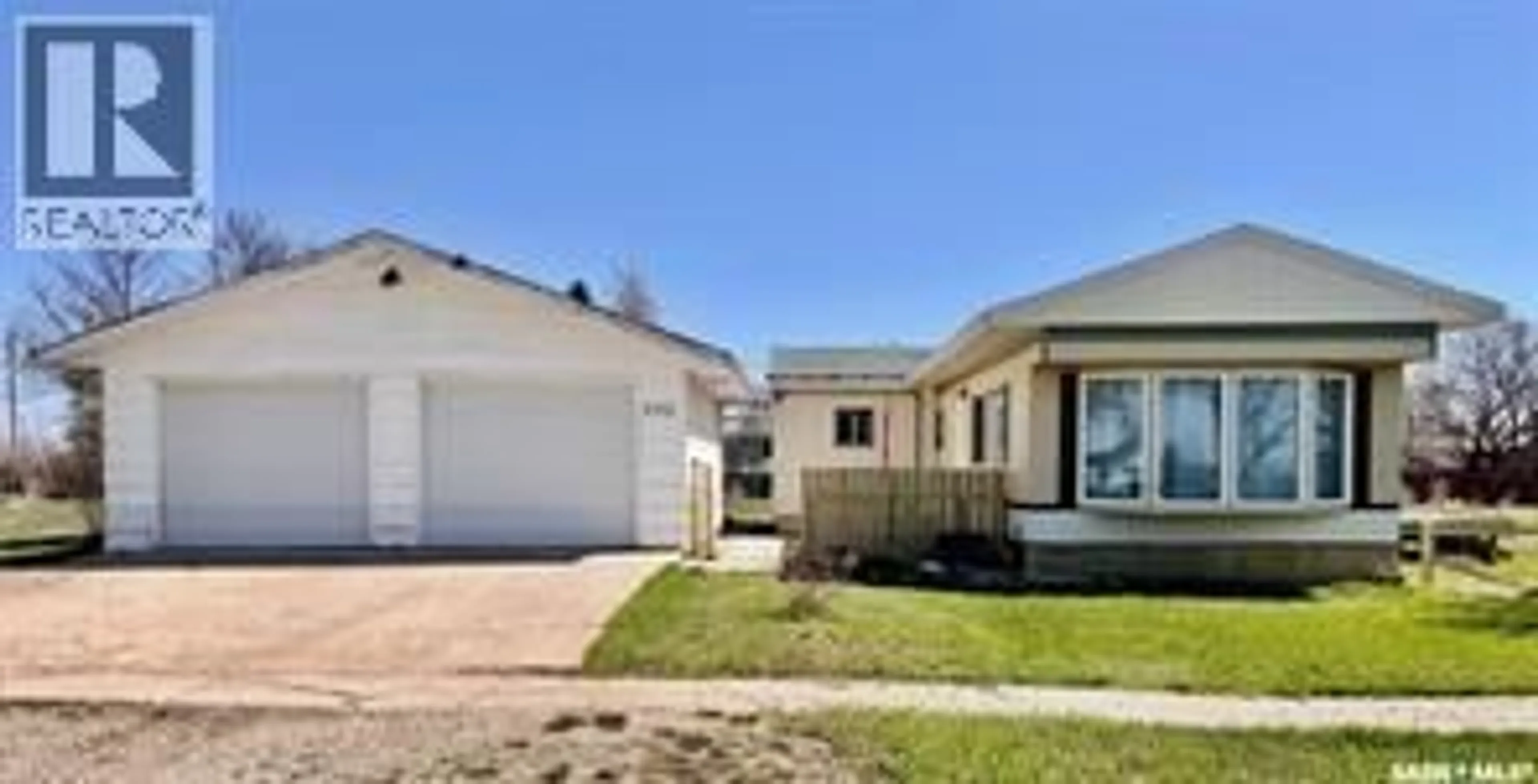 Home with vinyl exterior material, street for 305 2ND STREET, Milden Saskatchewan S0L2L0