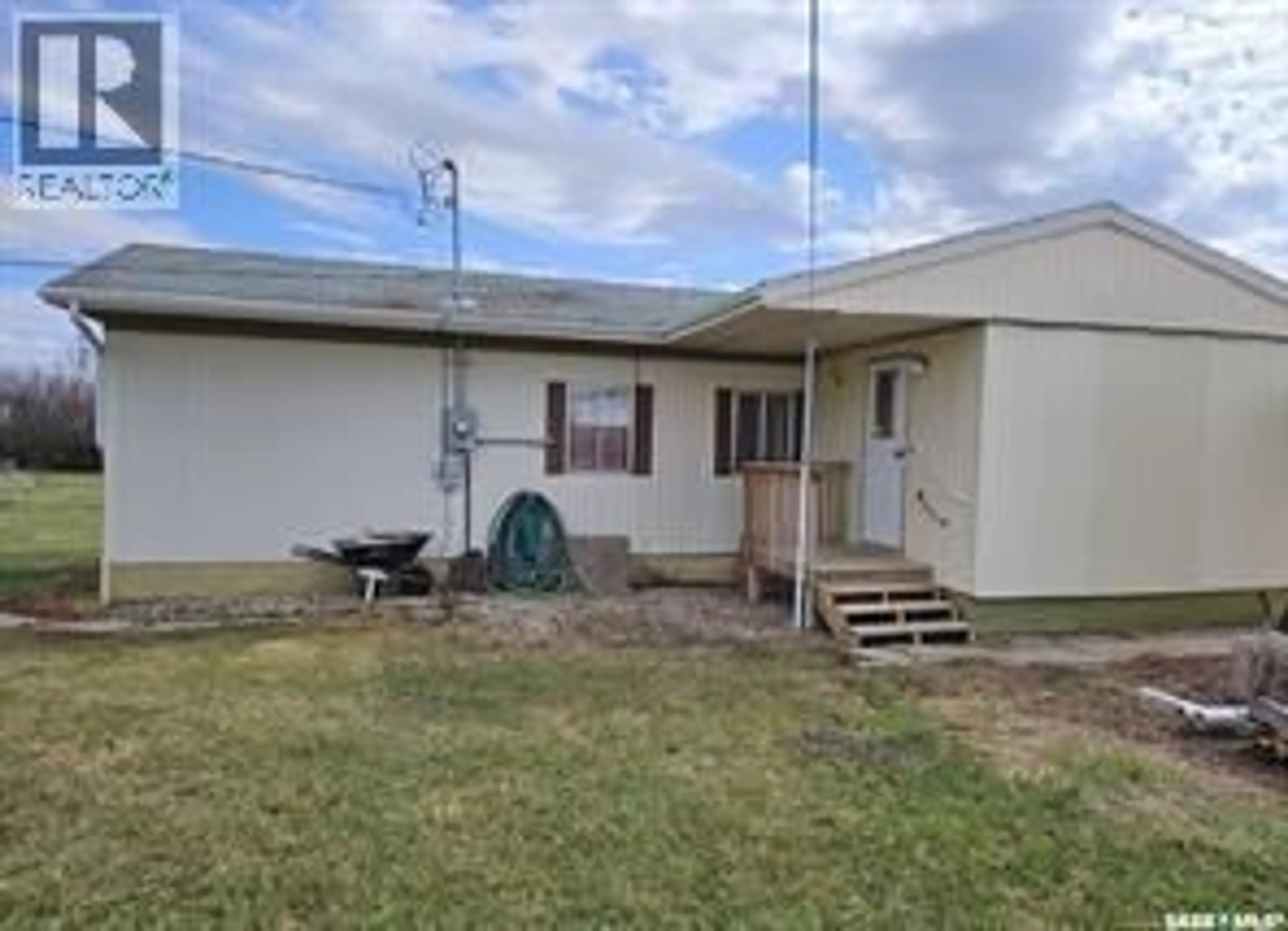 A pic from outside/outdoor area/front of a property/back of a property/a pic from drone, building for 305 2ND STREET, Milden Saskatchewan S0L2L0
