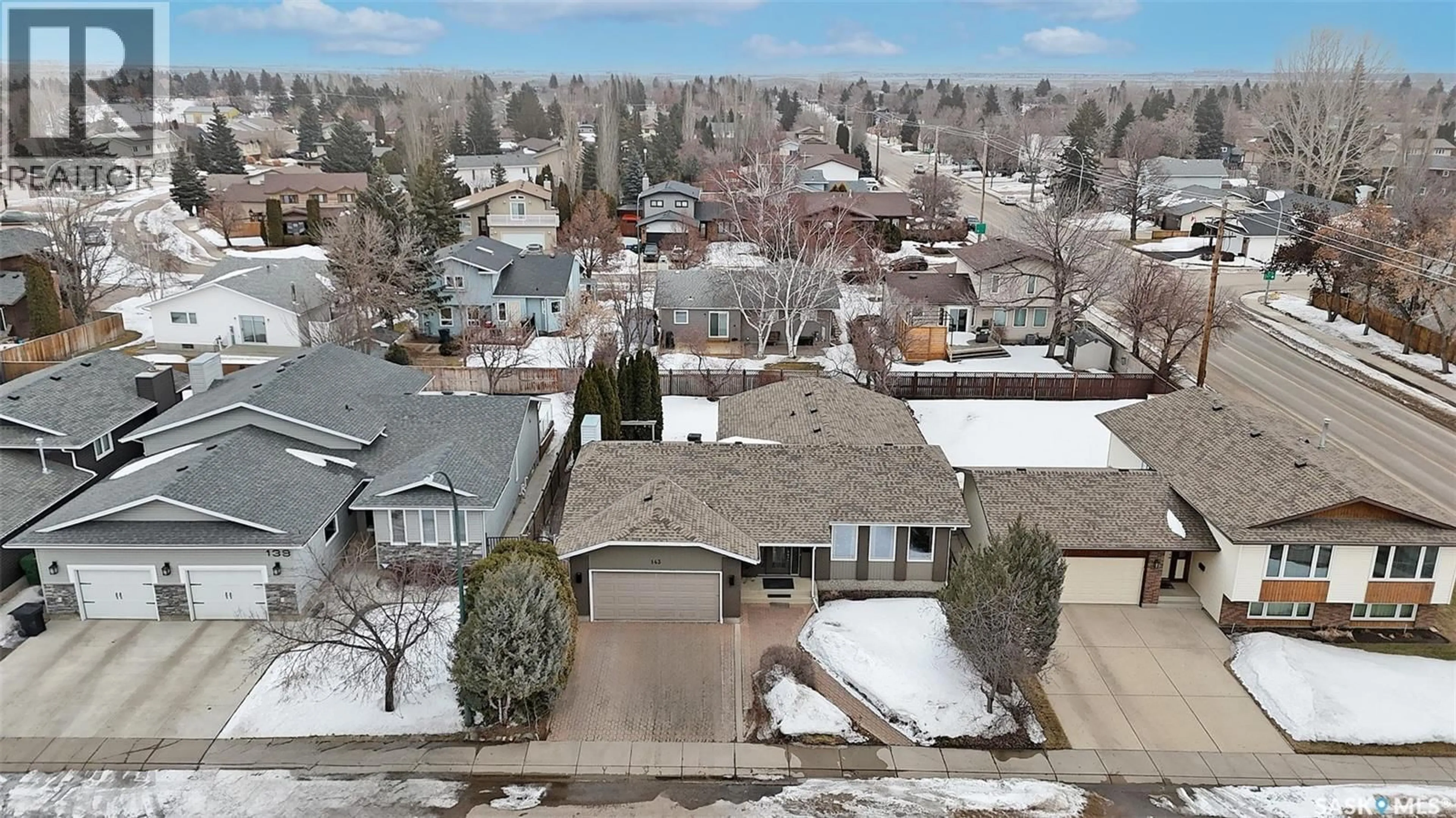A pic from outside/outdoor area/front of a property/back of a property/a pic from drone, street for 143 BIRO PLACE, Saskatoon Saskatchewan S7K7V6