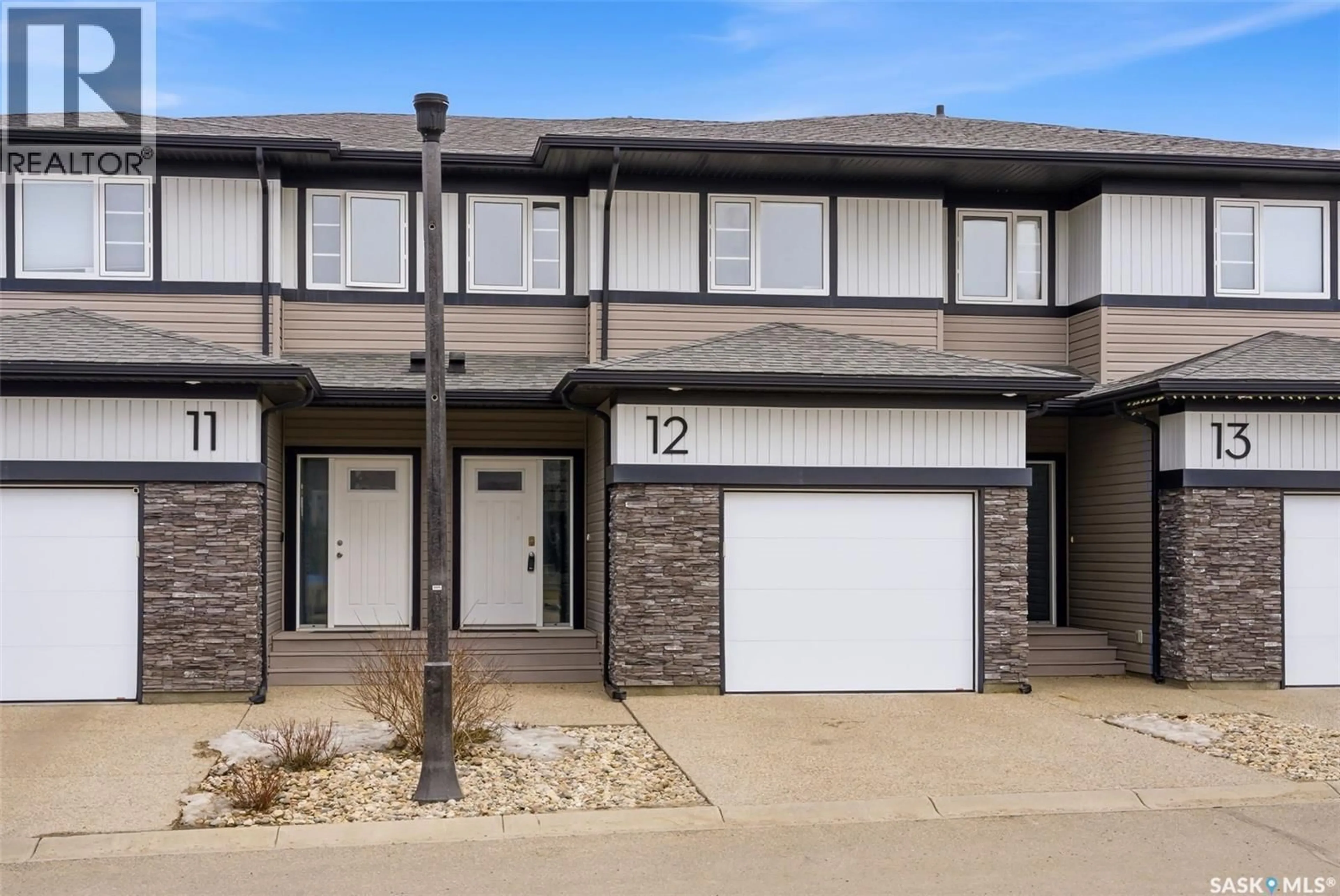 Home with brick exterior material, street for 12 - 5301 BEACON DRIVE, Regina Saskatchewan S4W0R6