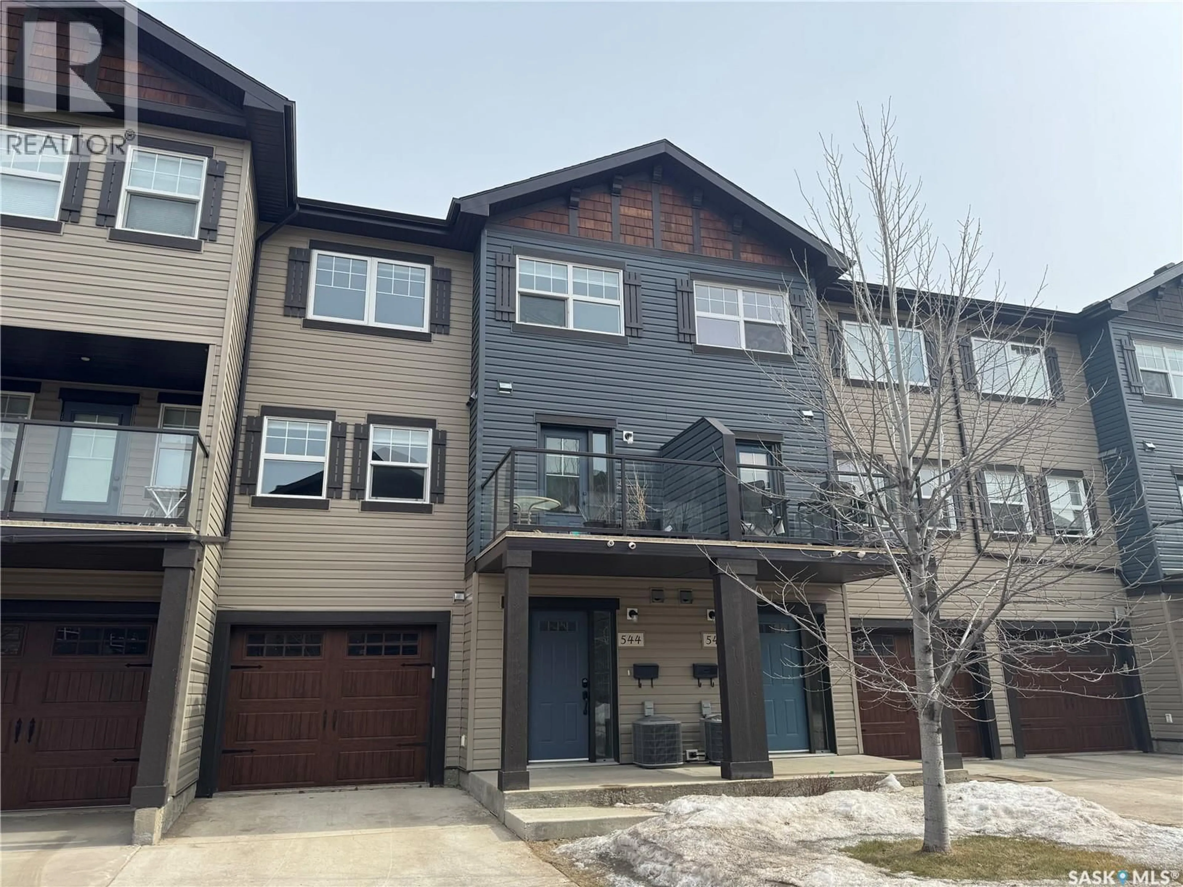 A pic from outside/outdoor area/front of a property/back of a property/a pic from drone, street for 544 150 LANGLOIS WAY, Saskatoon Saskatchewan S7T0K9