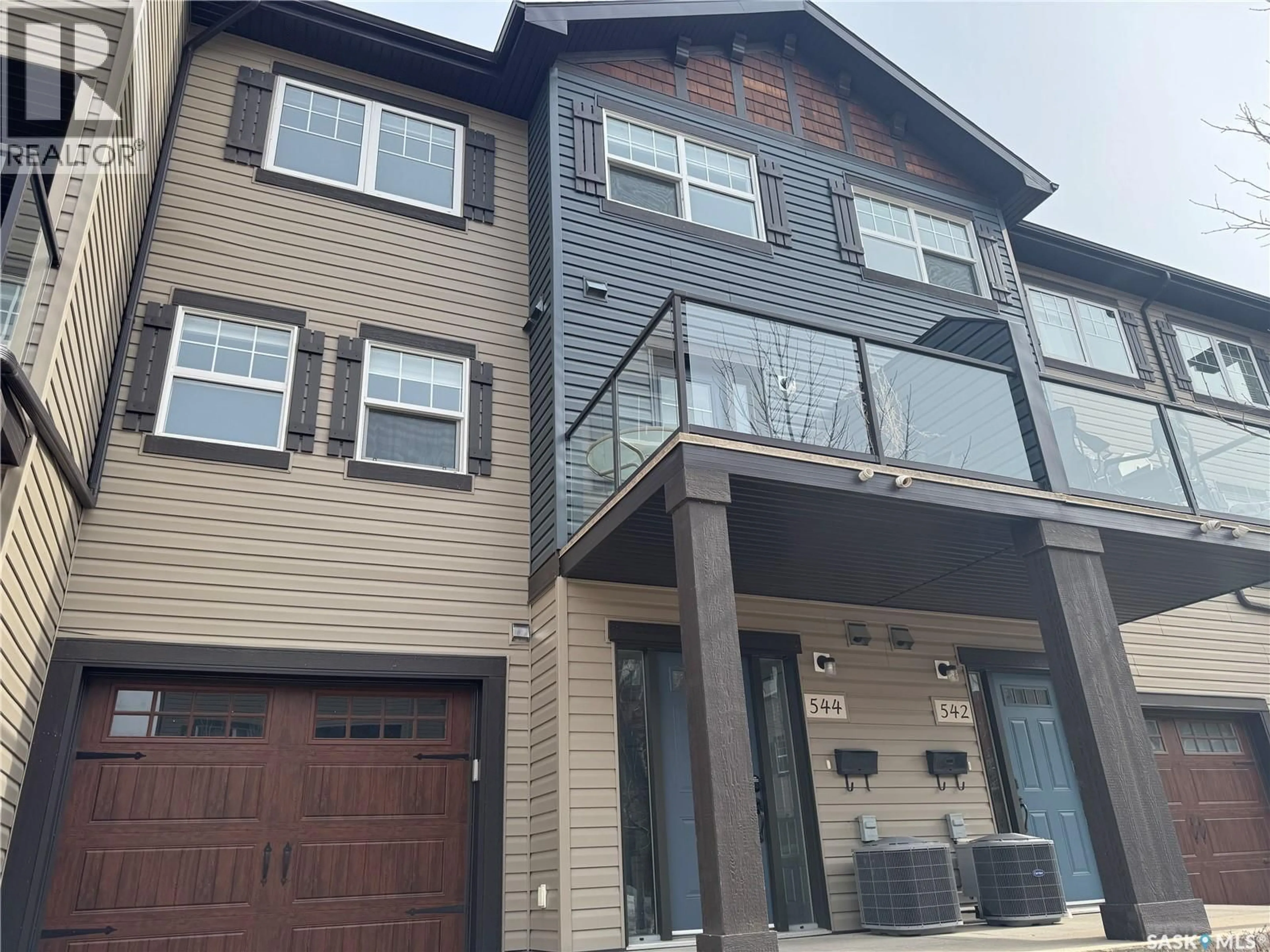 Home with vinyl exterior material, street for 544 150 LANGLOIS WAY, Saskatoon Saskatchewan S7T0K9