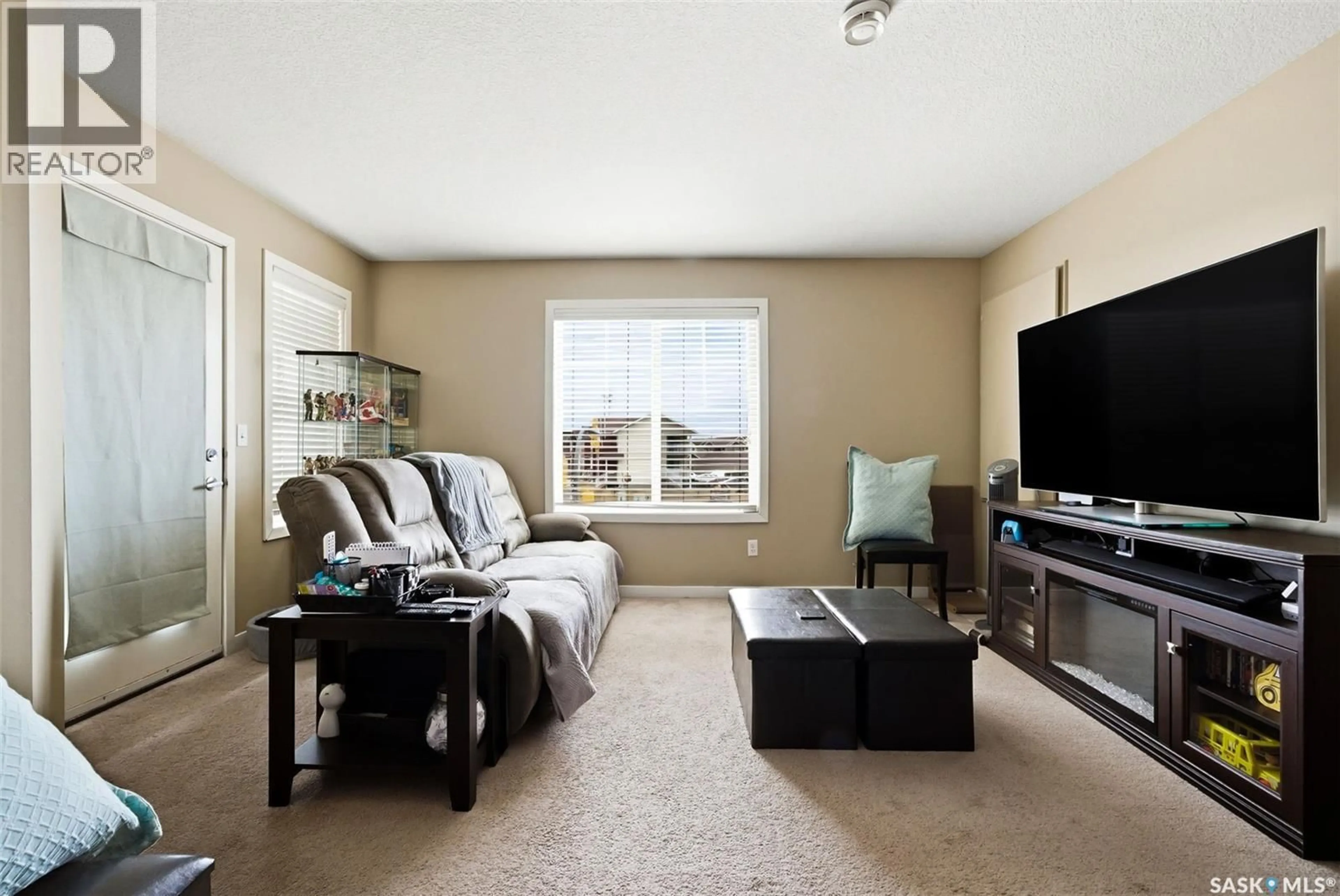 Living room with furniture, unknown for 34 - 5023 JAMES HILL ROAD, Regina Saskatchewan S4W0B9