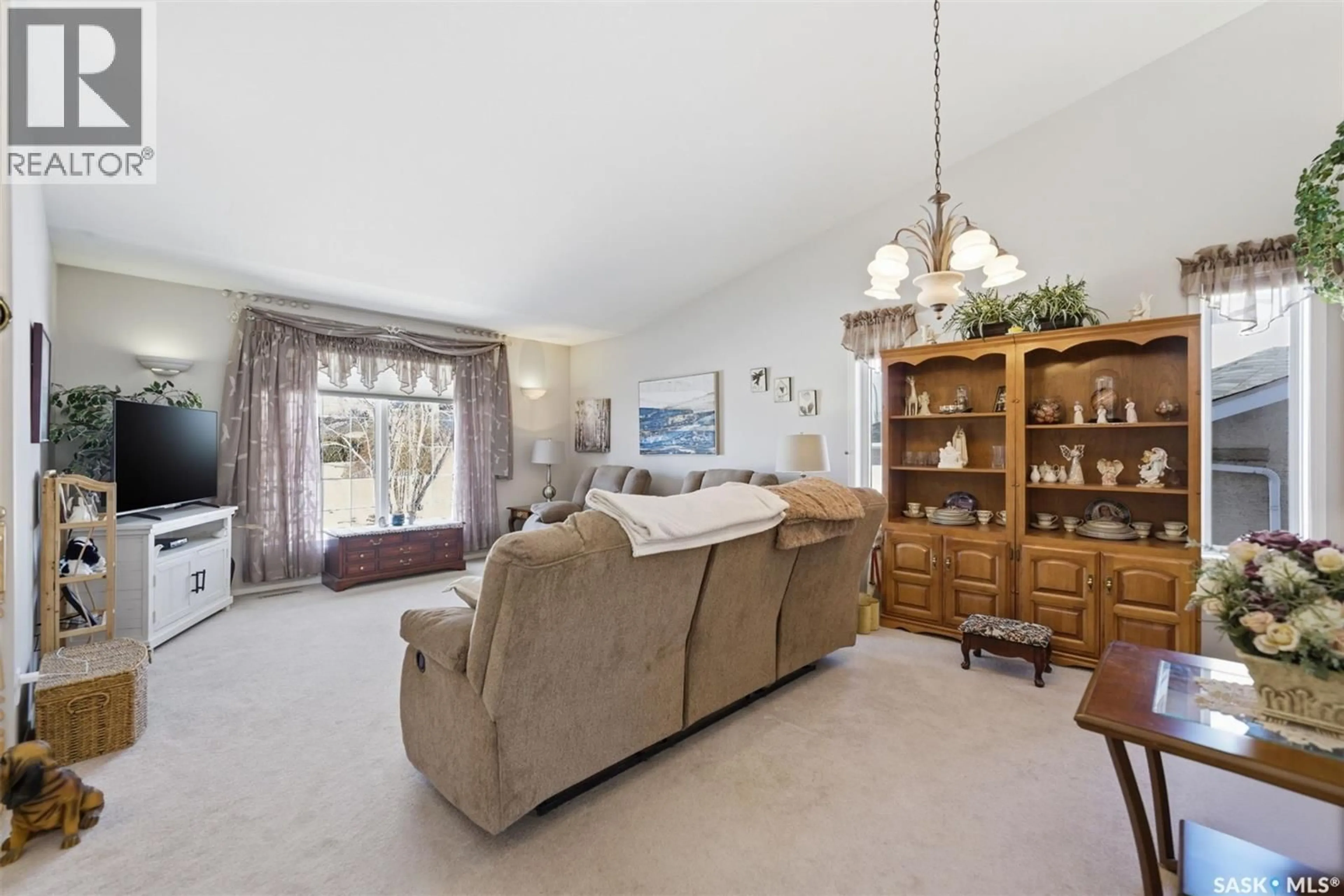 Living room with furniture, unknown for 707 BAYVIEW CLOSE, Saskatoon Saskatchewan S7V1B7