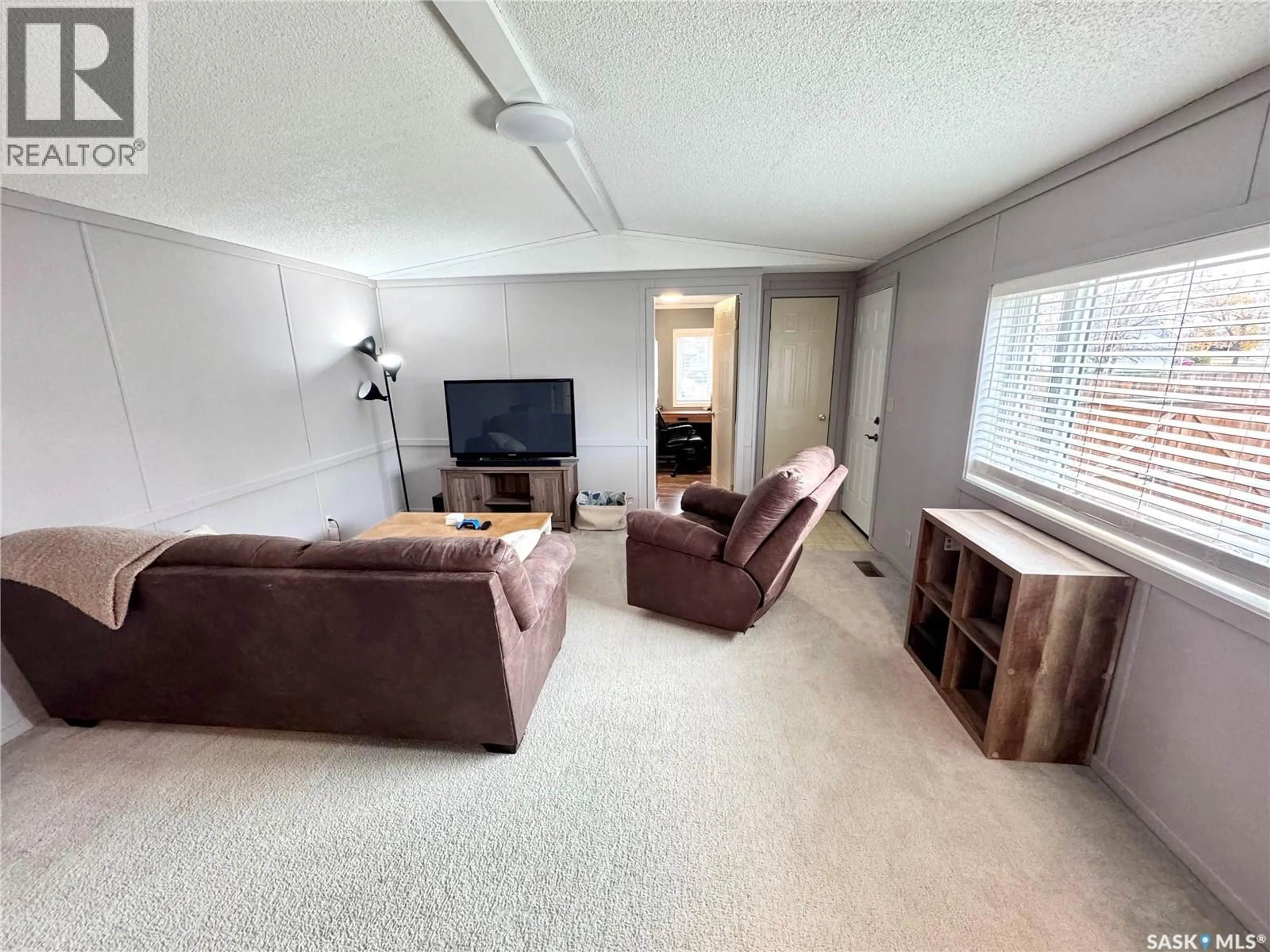 Living room with furniture, unknown for 105 ROULEAU STREET, Rouleau Saskatchewan S0G4H0