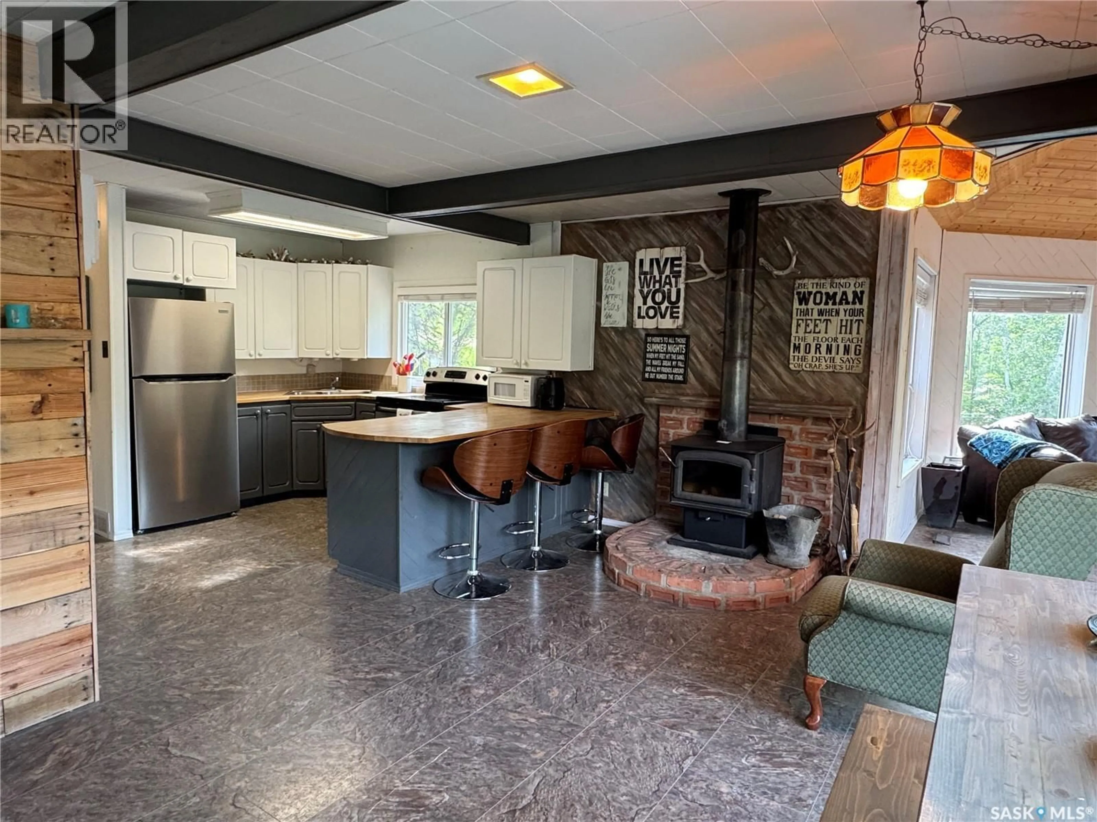 Open concept kitchen, ceramic/tile floor for 102 DORAN AVENUE, Christopher Lake Saskatchewan S0J0N0