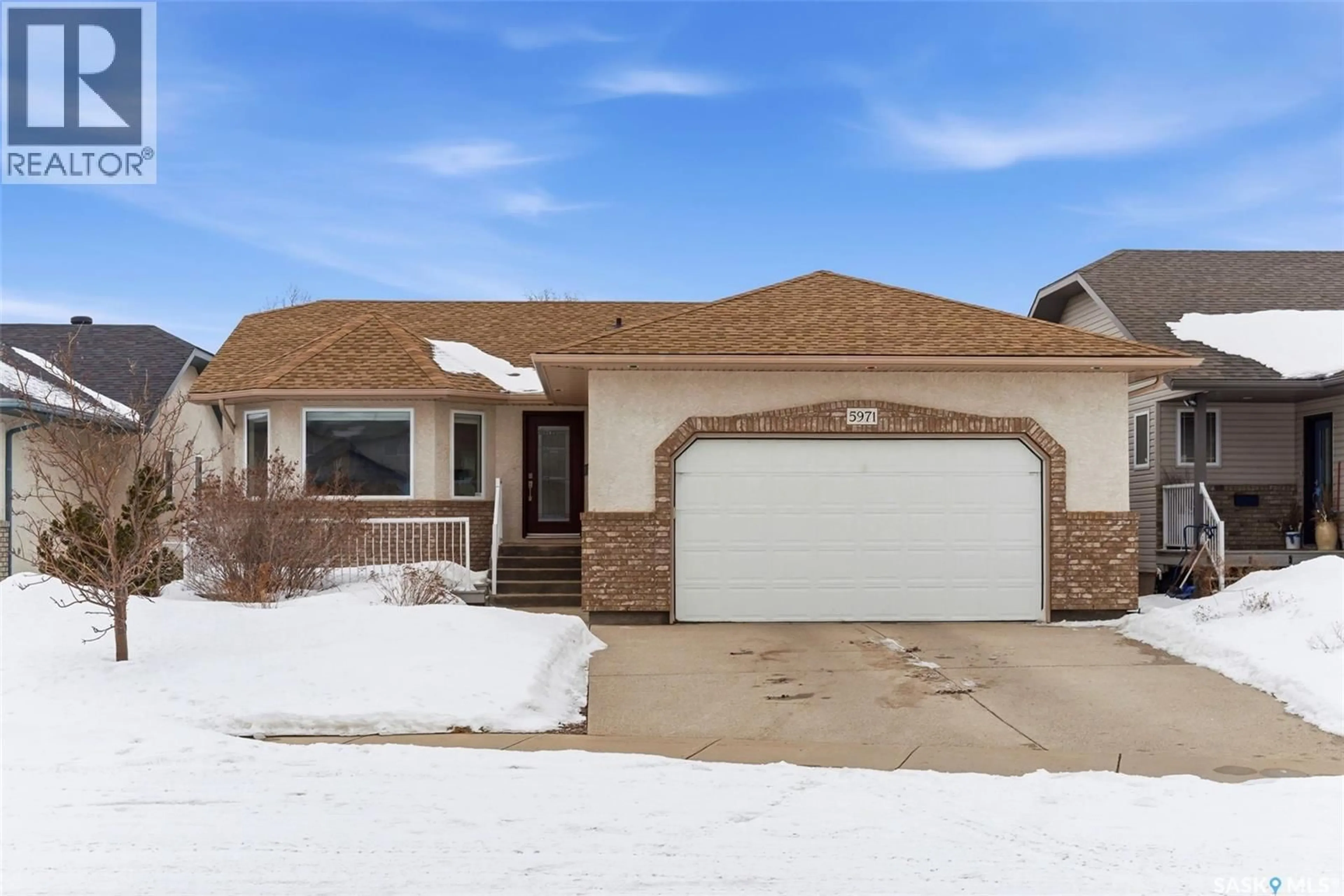 Home with brick exterior material, street for 5971 MALLARD WAY, Regina Saskatchewan S4T7X6