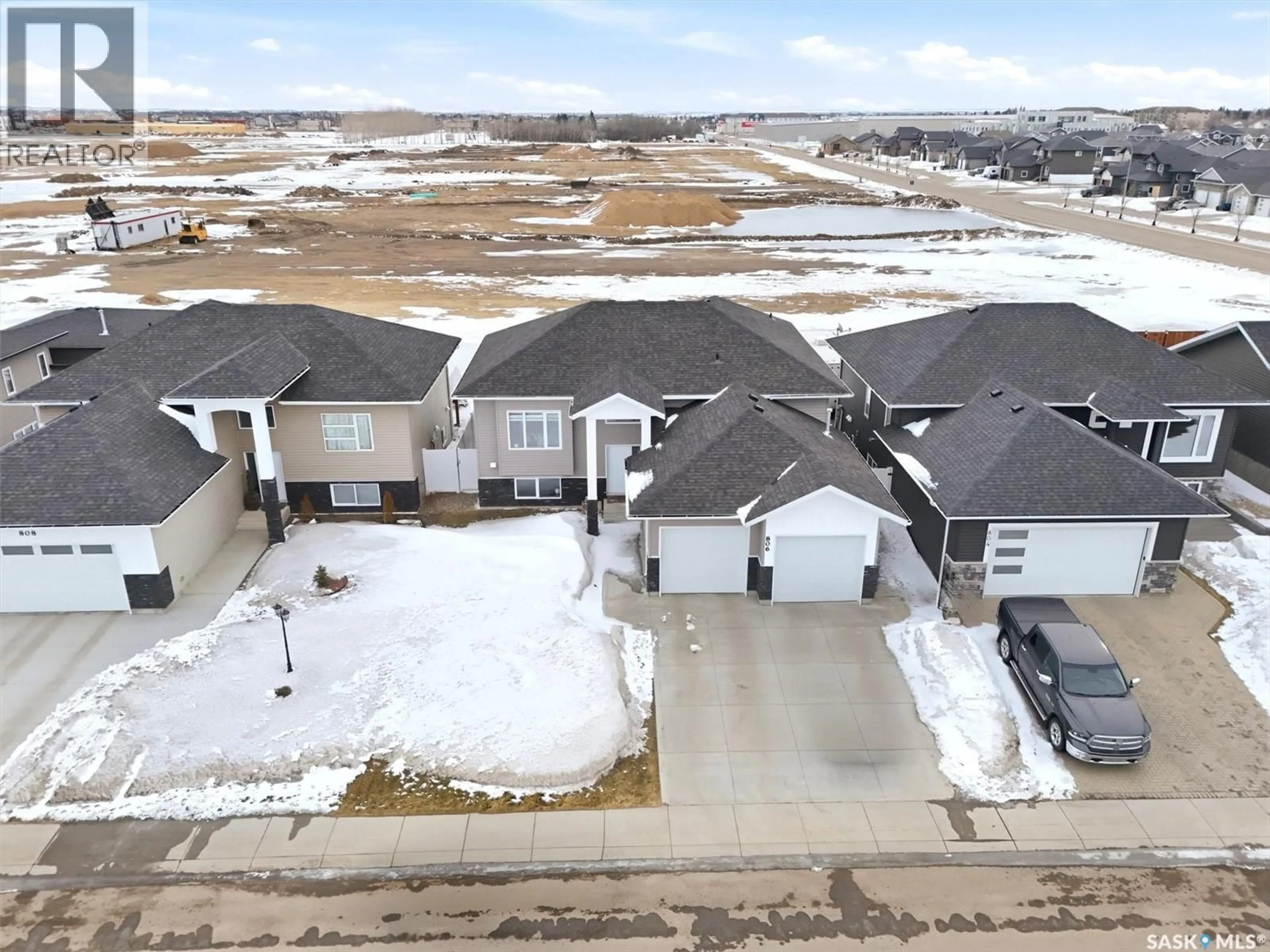 A pic from outside/outdoor area/front of a property/back of a property/a pic from drone, street for 806 1ST AVENUE N, Warman Saskatchewan S0K4S0