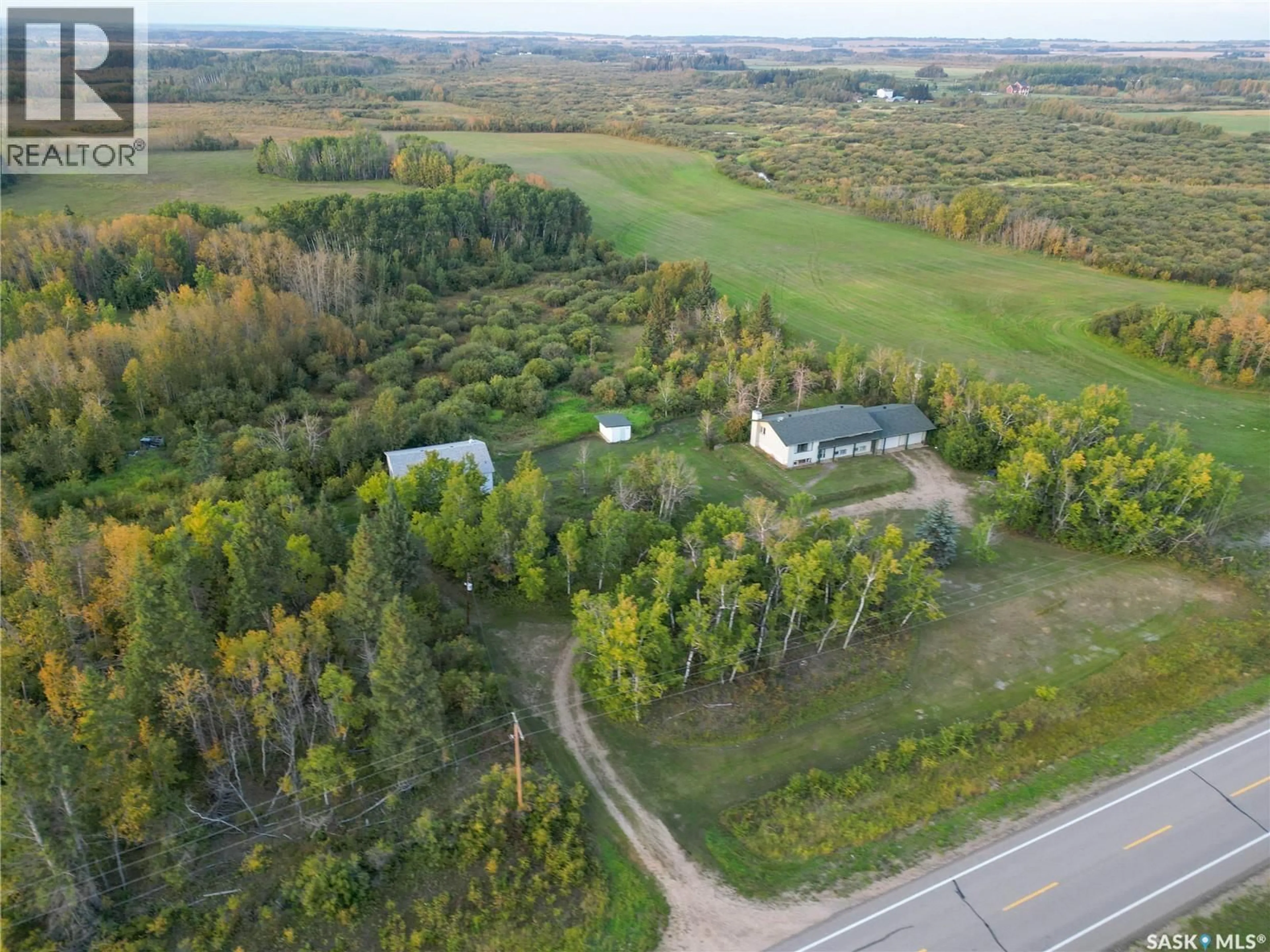 A pic from outside/outdoor area/front of a property/back of a property/a pic from drone, unknown for SPRUCE HOME ACREAGE, Buckland Rm No. 491 Saskatchewan S0J2N0