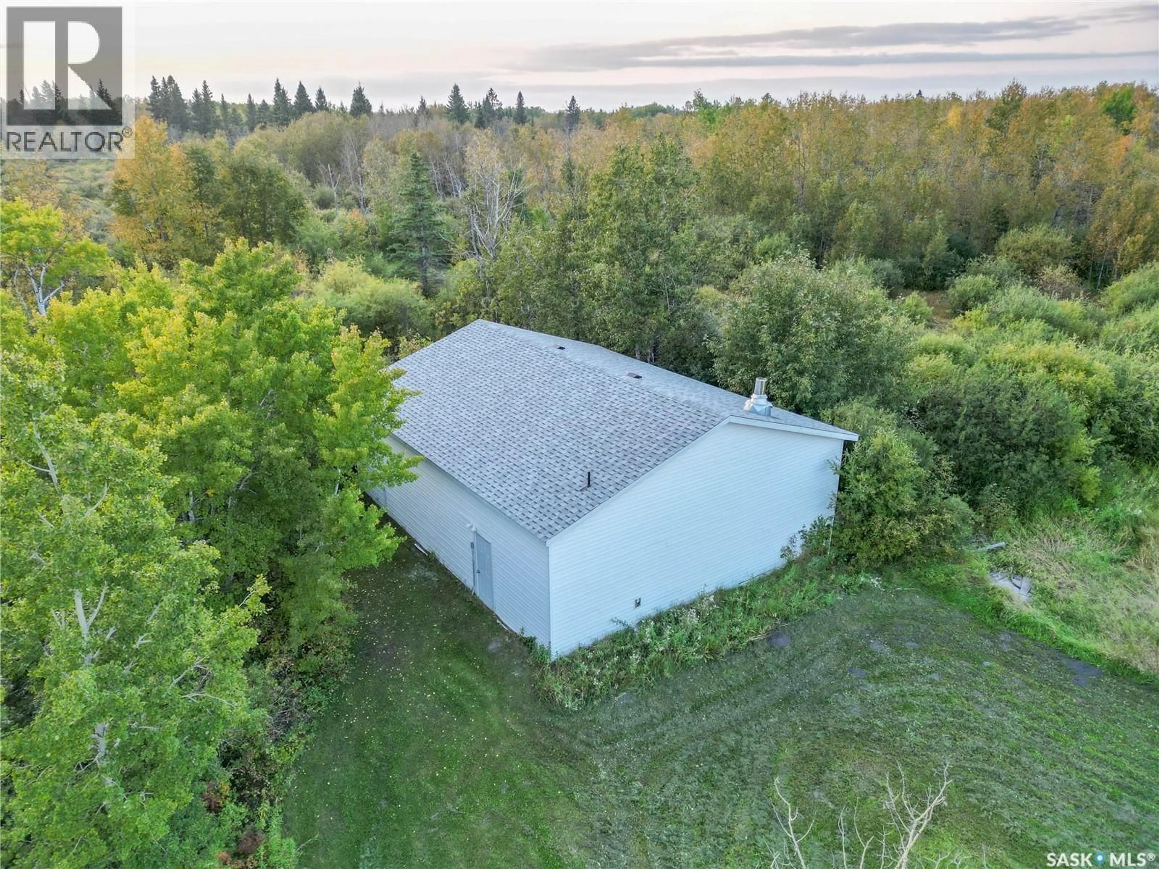 A pic from outside/outdoor area/front of a property/back of a property/a pic from drone, water/lake/river/ocean view for SPRUCE HOME ACREAGE, Buckland Rm No. 491 Saskatchewan S0J2N0
