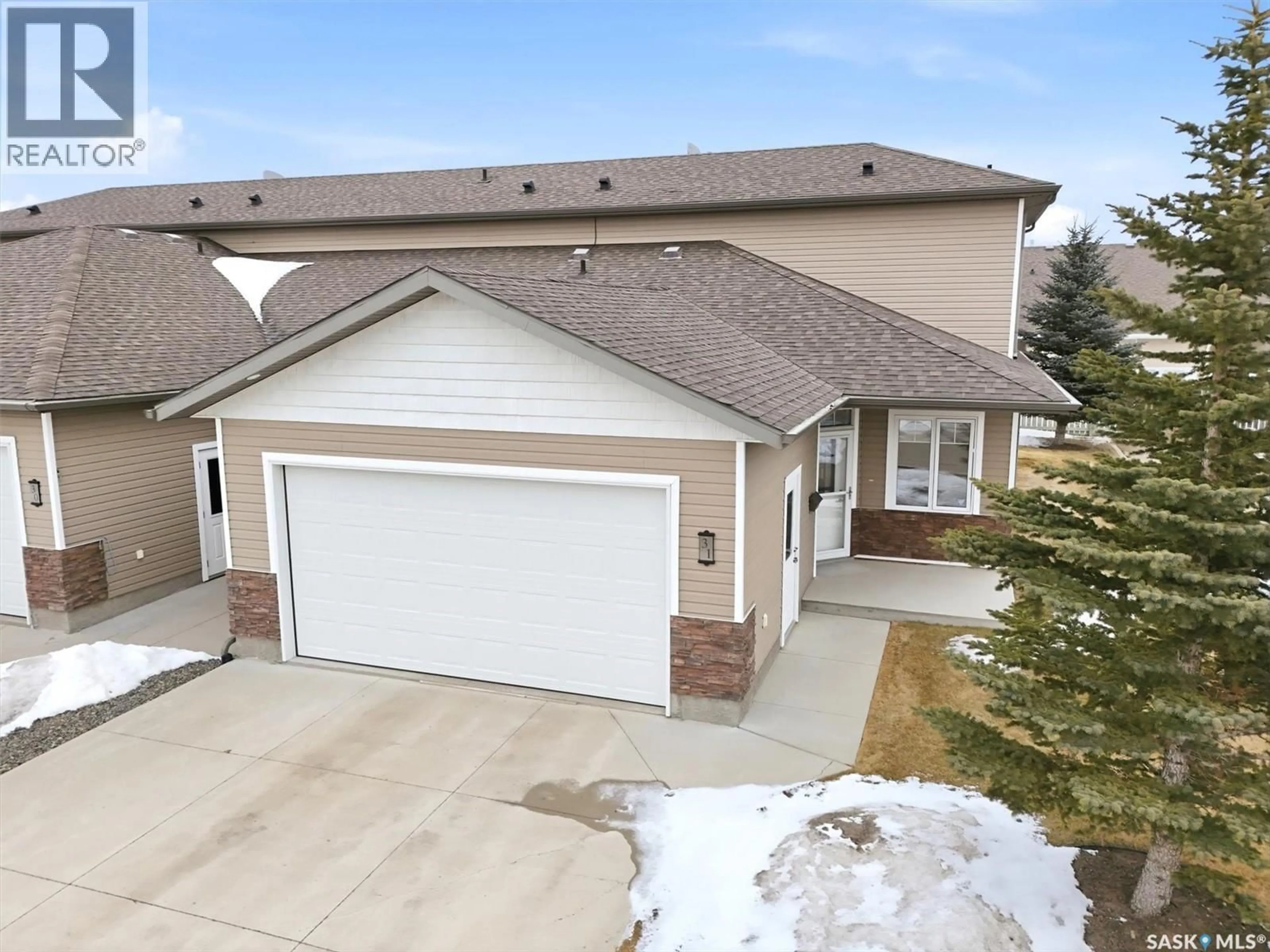 A pic from outside/outdoor area/front of a property/back of a property/a pic from drone, street for 31 100 BROOKLYN LANE, Warman Saskatchewan S0K0A1