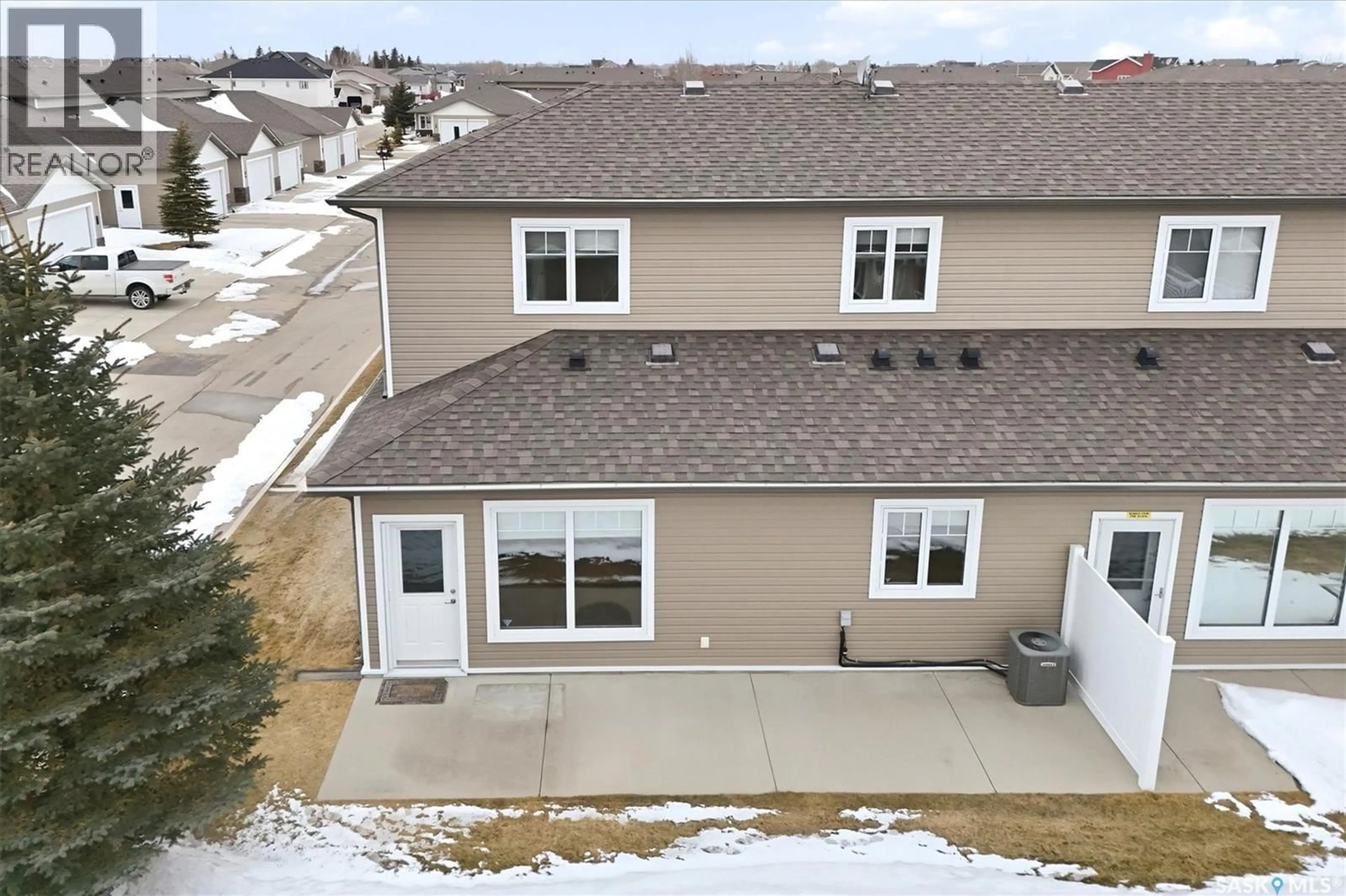 A pic from outside/outdoor area/front of a property/back of a property/a pic from drone, street for 31 100 BROOKLYN LANE, Warman Saskatchewan S0K0A1