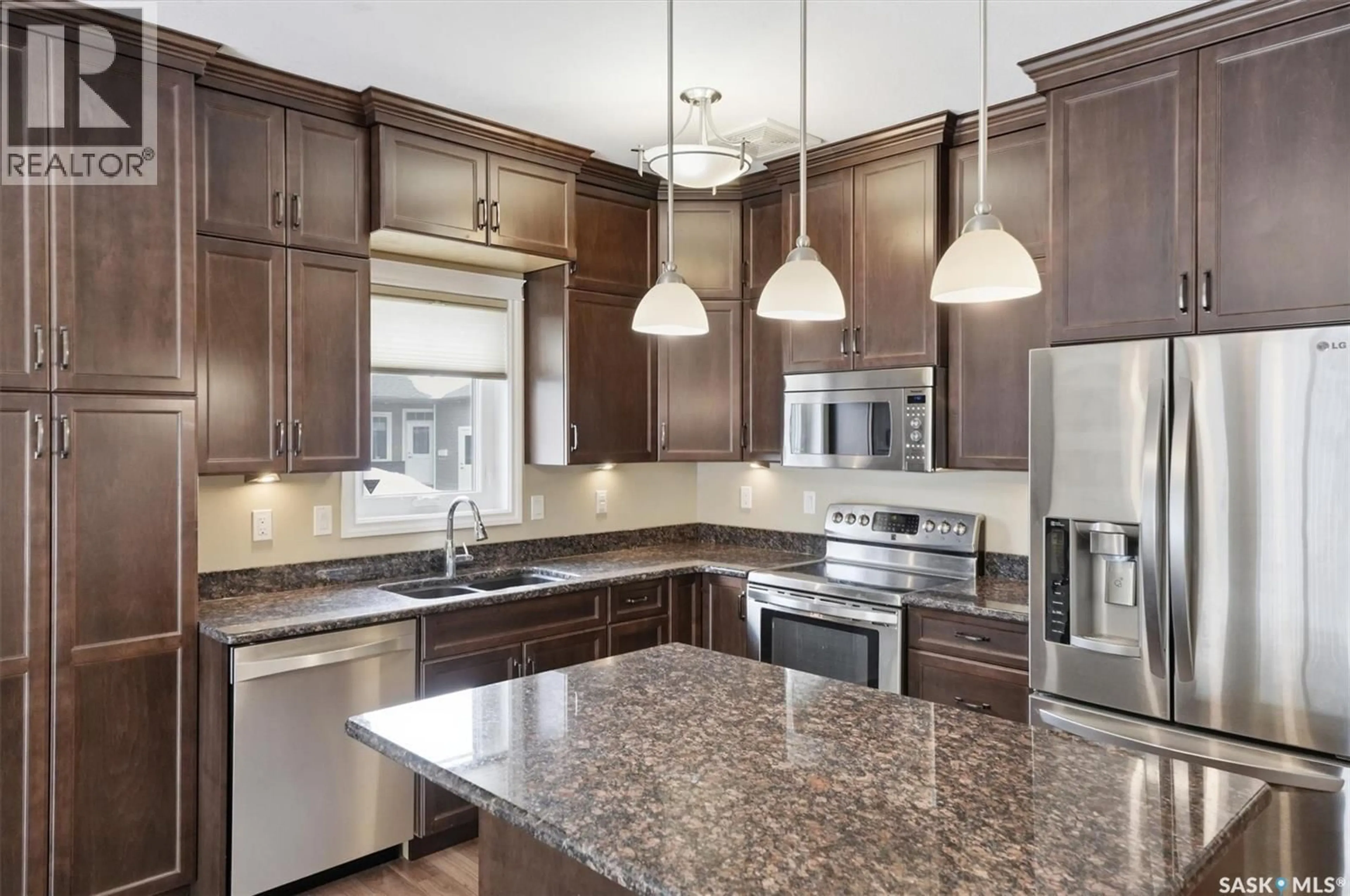 Contemporary kitchen, ceramic/tile floor for 31 100 BROOKLYN LANE, Warman Saskatchewan S0K0A1