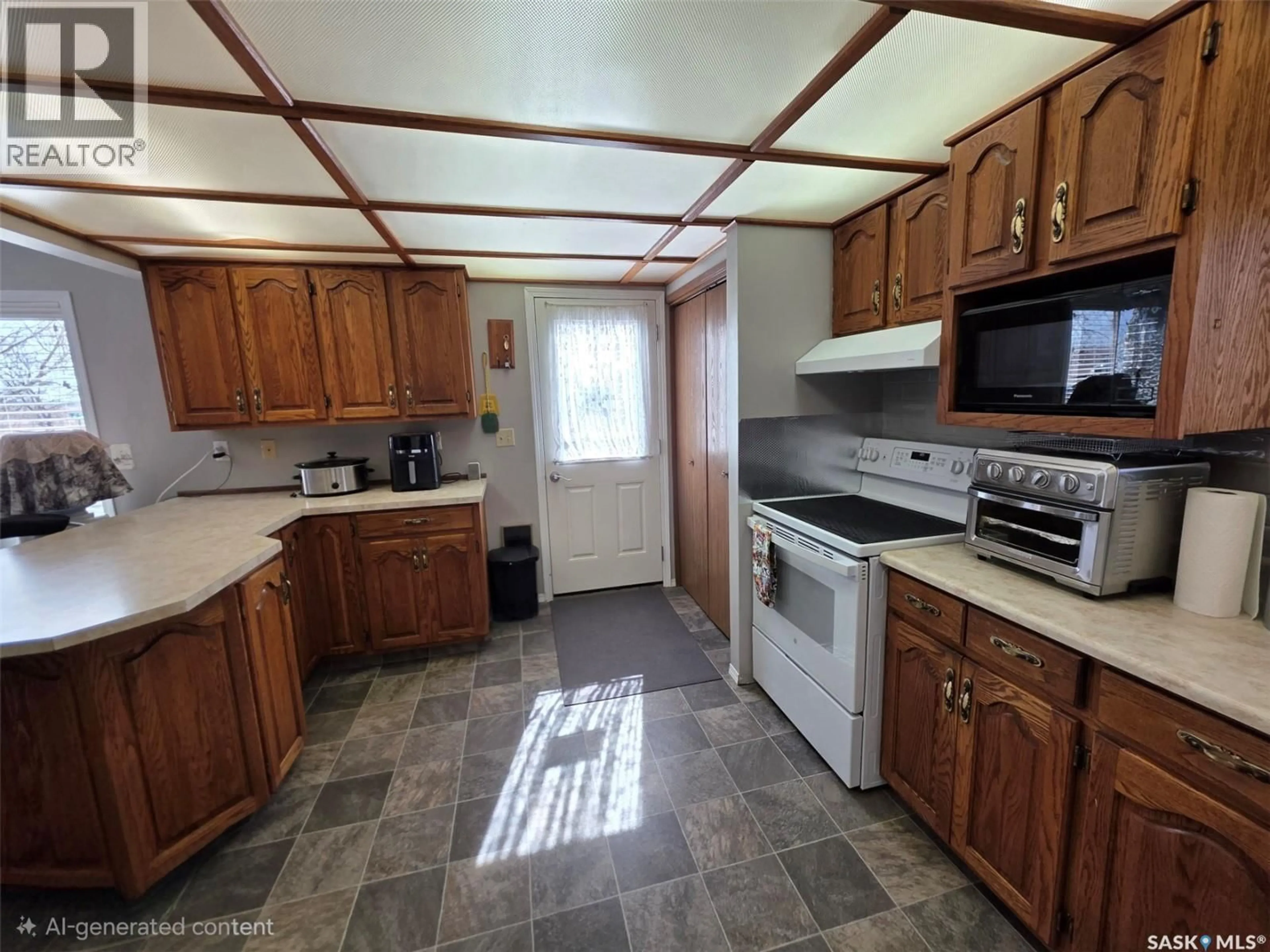 Standard kitchen, ceramic/tile floor for 113 3RD STREET, Mankota Saskatchewan S0H2W0