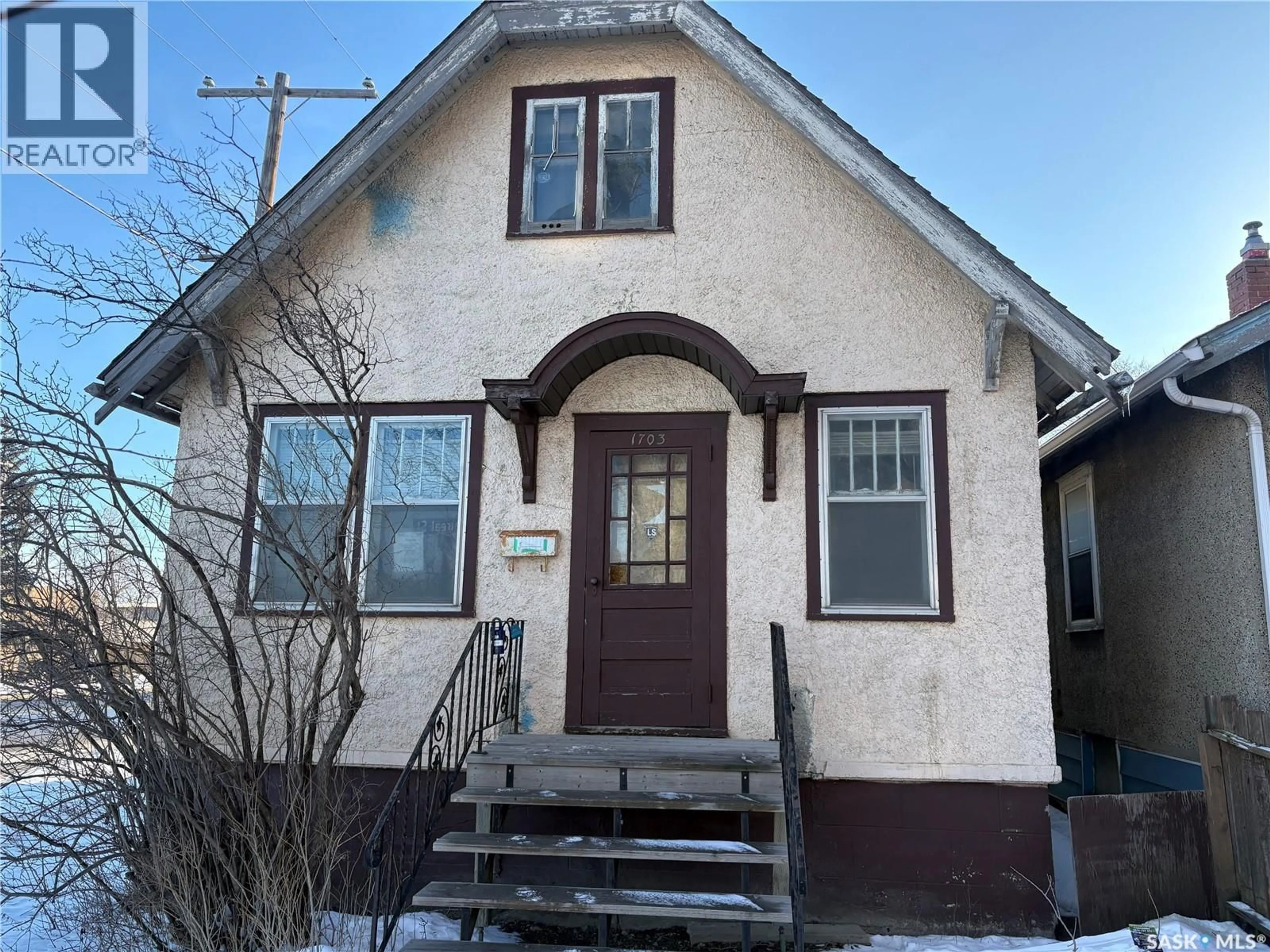 Home with vinyl exterior material, street for 1703 MONTREAL STREET, Regina Saskatchewan S4P1K8