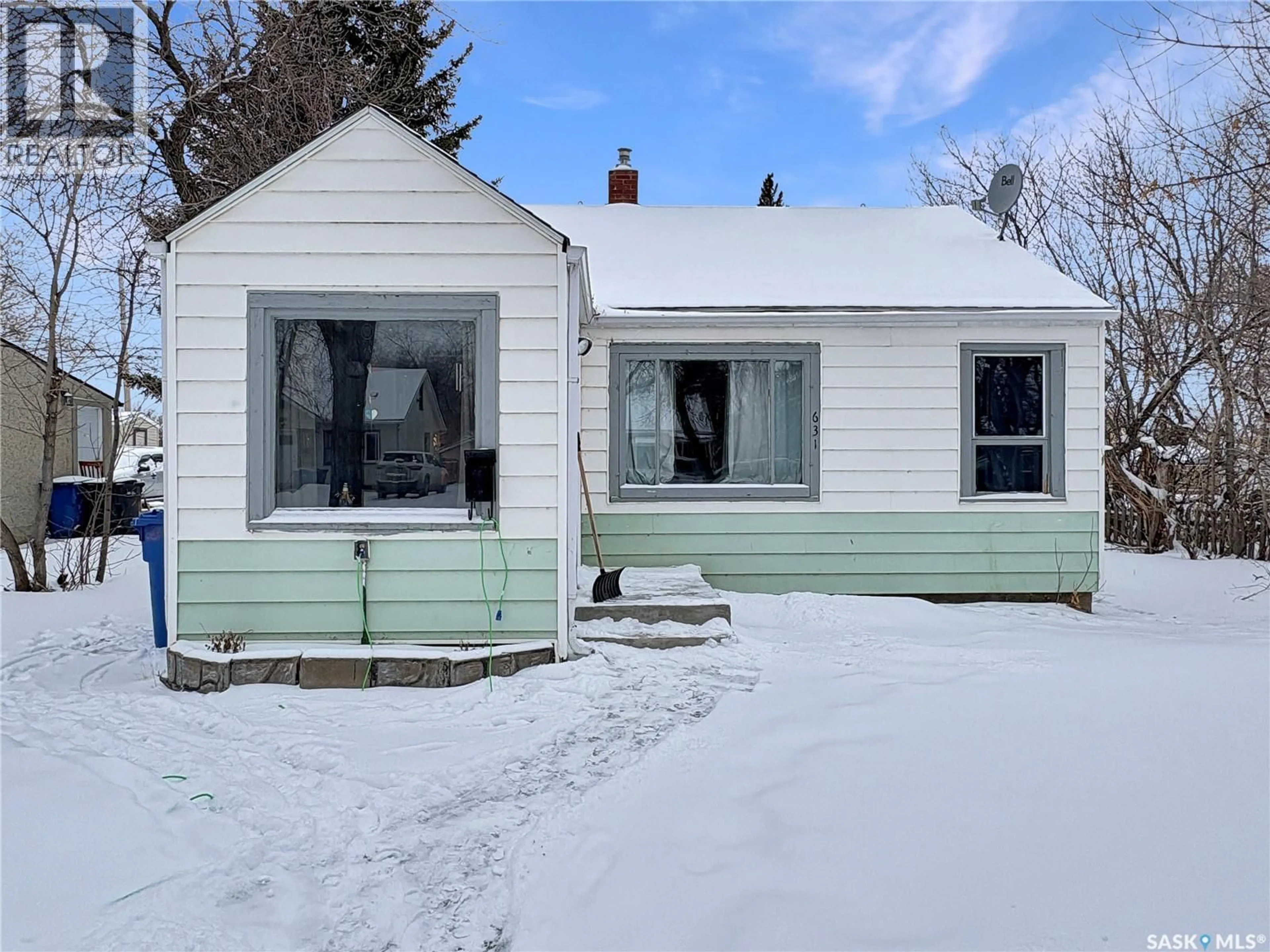 Home with vinyl exterior material, street for 631 101ST STREET, North Battleford Saskatchewan S9A0Y7