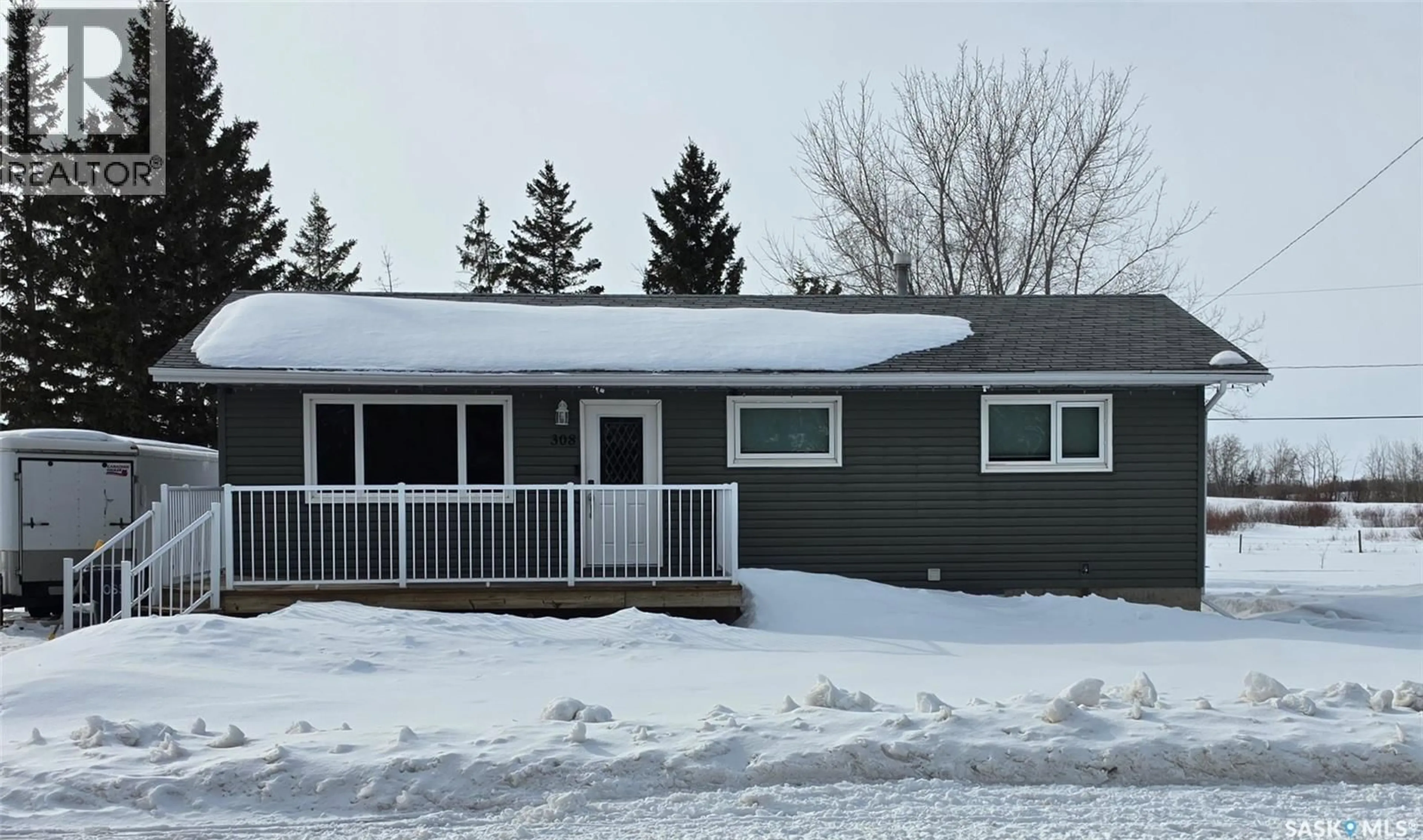 Home with vinyl exterior material, street for 308 MAIN STREET, Lintlaw Saskatchewan S0A2H0
