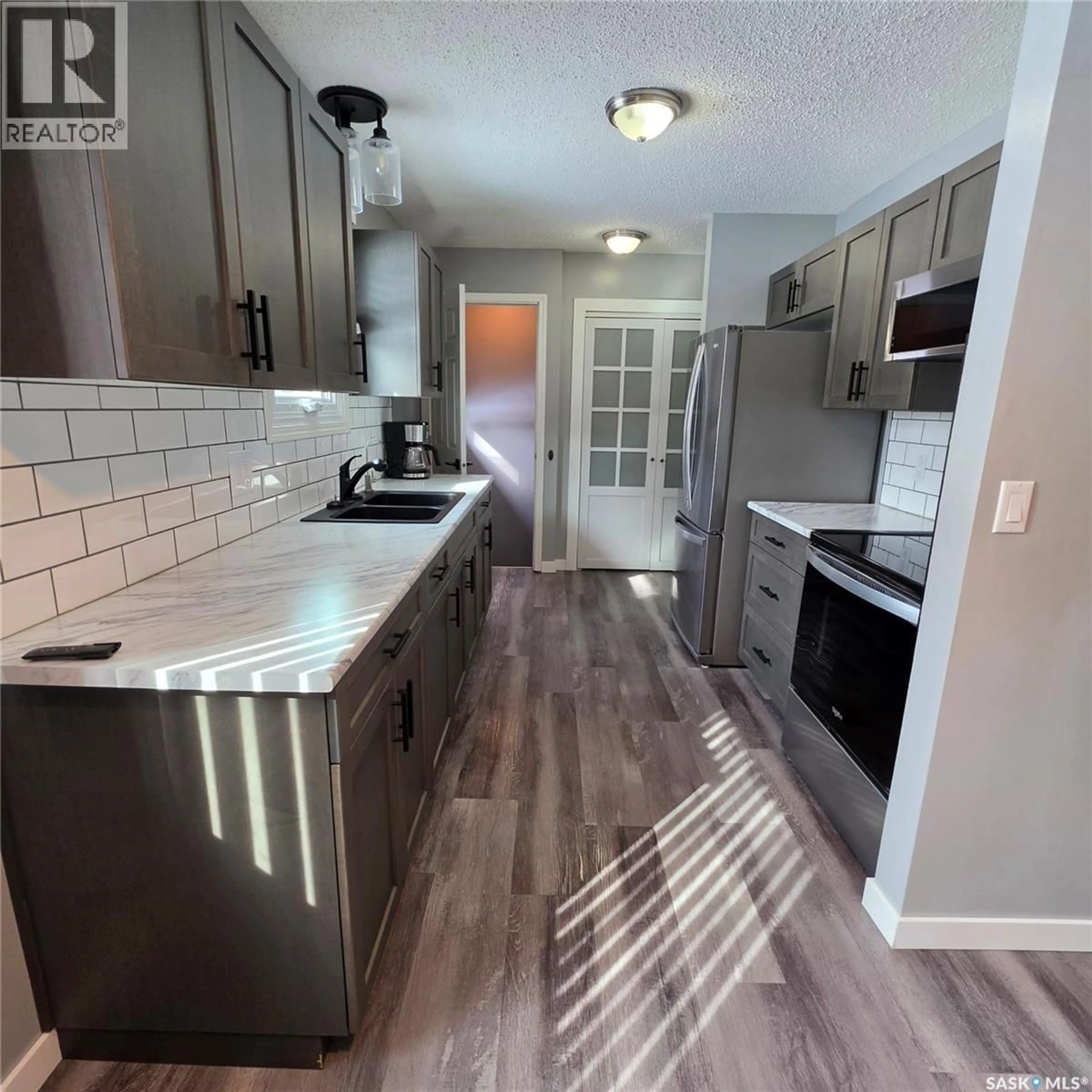 Open concept kitchen, unknown for 308 MAIN STREET, Lintlaw Saskatchewan S0A2H0